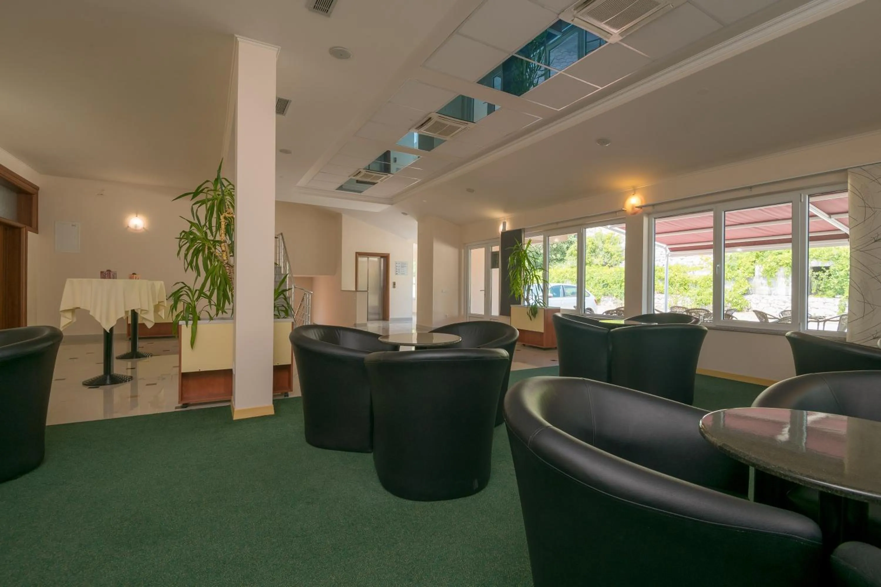 Communal lounge/ TV room in Hotel Adria