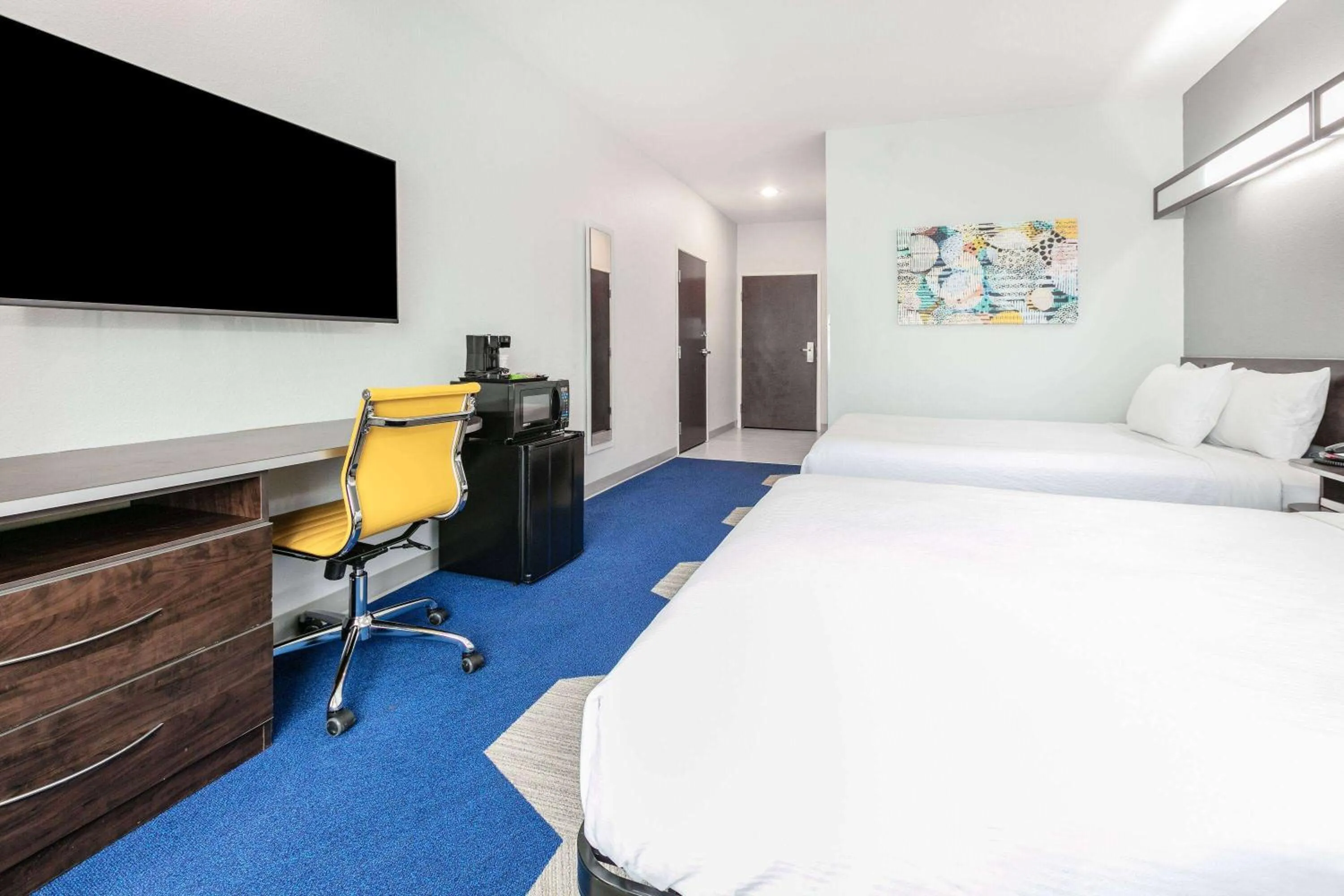 Bed in Microtel Inn & Suites by Wyndham Austin Airport