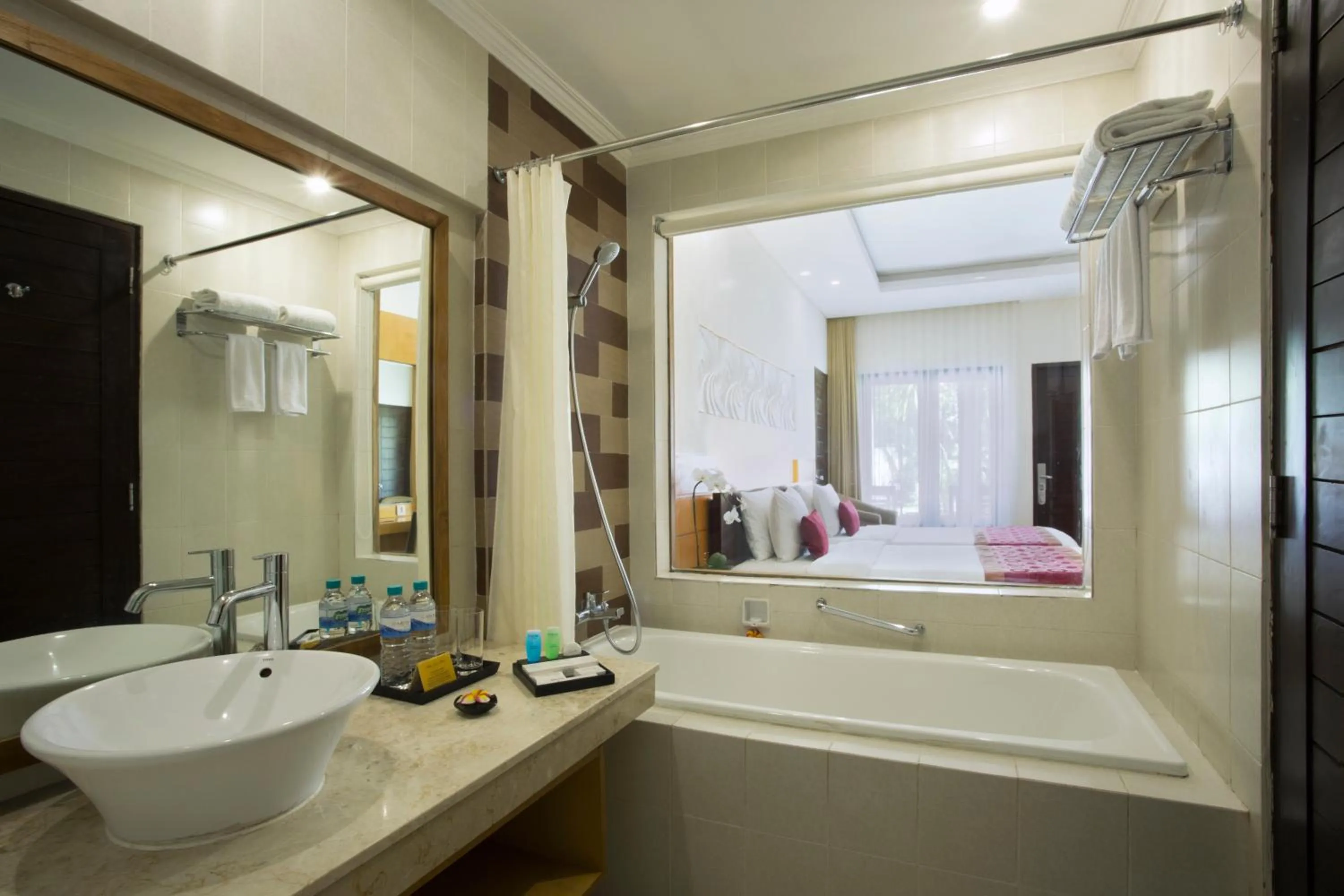 Bathroom, Bed in Adhi Jaya Hotel