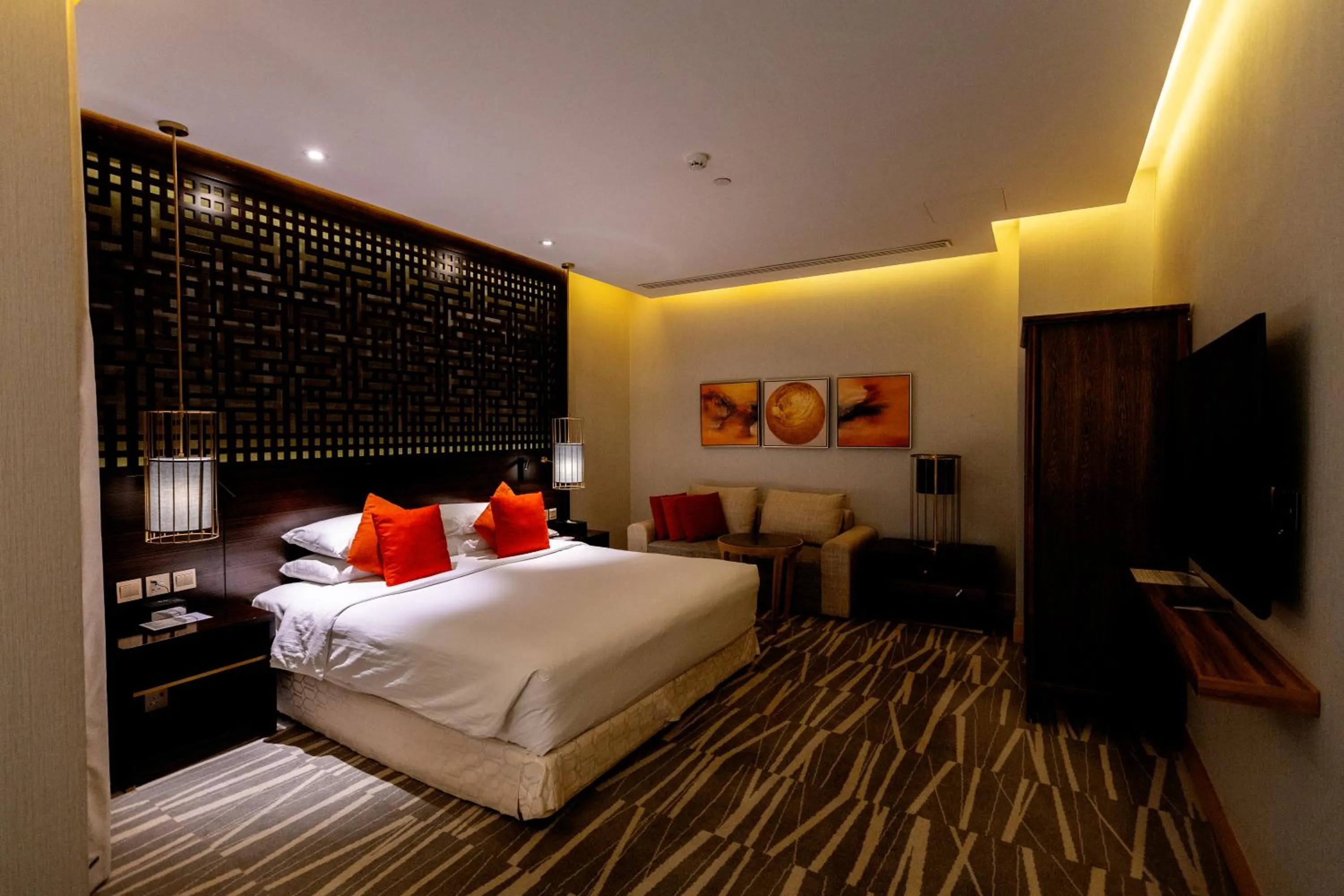 Bedroom, Bed in Ramada Hotel & Suites by Wyndham Al Qassim