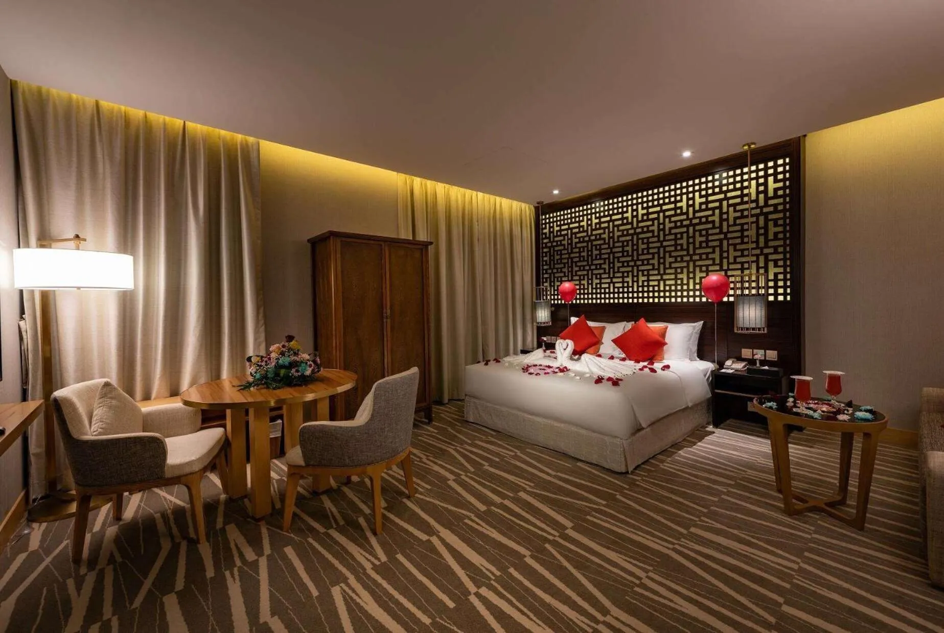 Photo of the whole room, Bed in Ramada Hotel & Suites by Wyndham Al Qassim