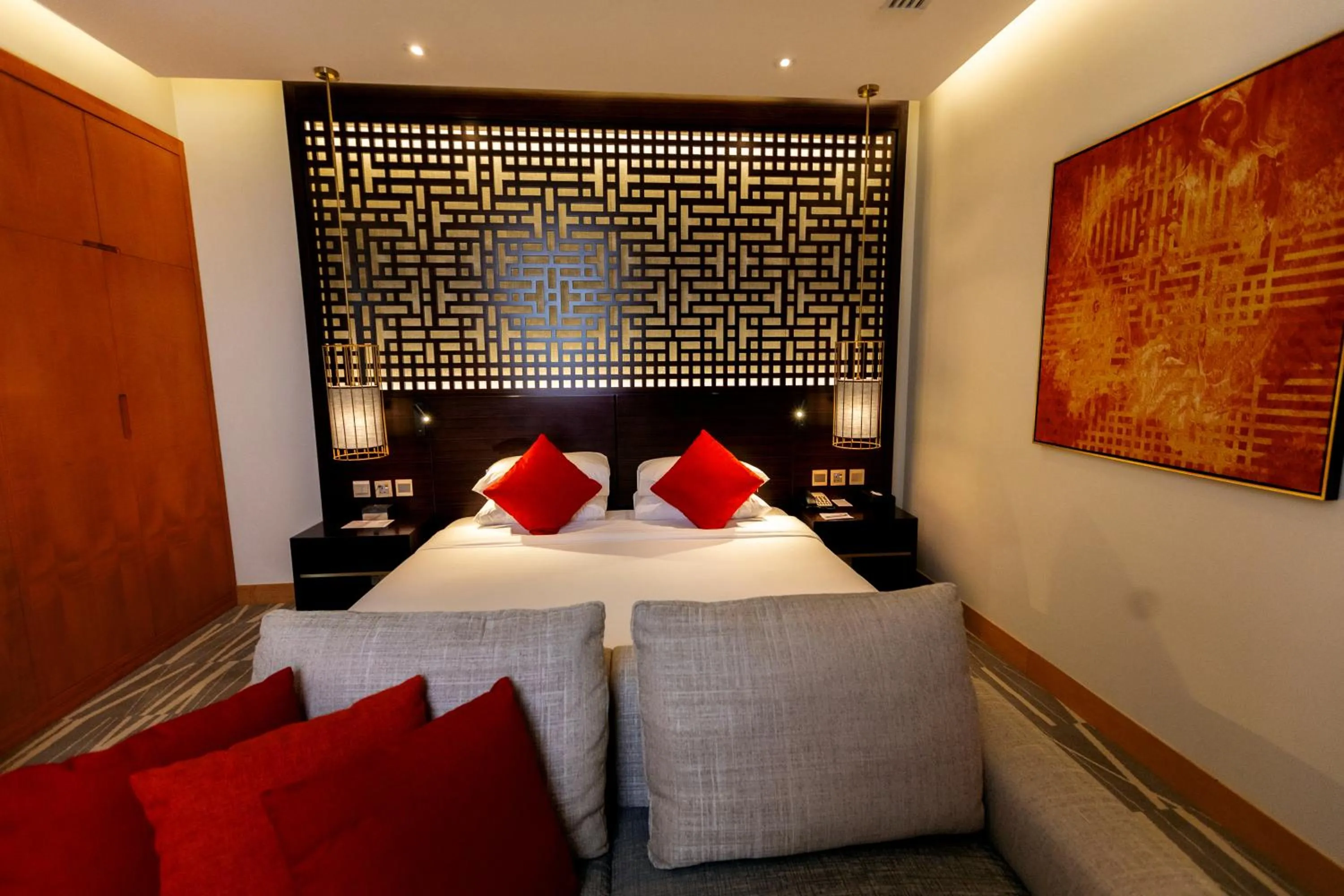 Bedroom, Bed in Ramada Hotel & Suites by Wyndham Al Qassim