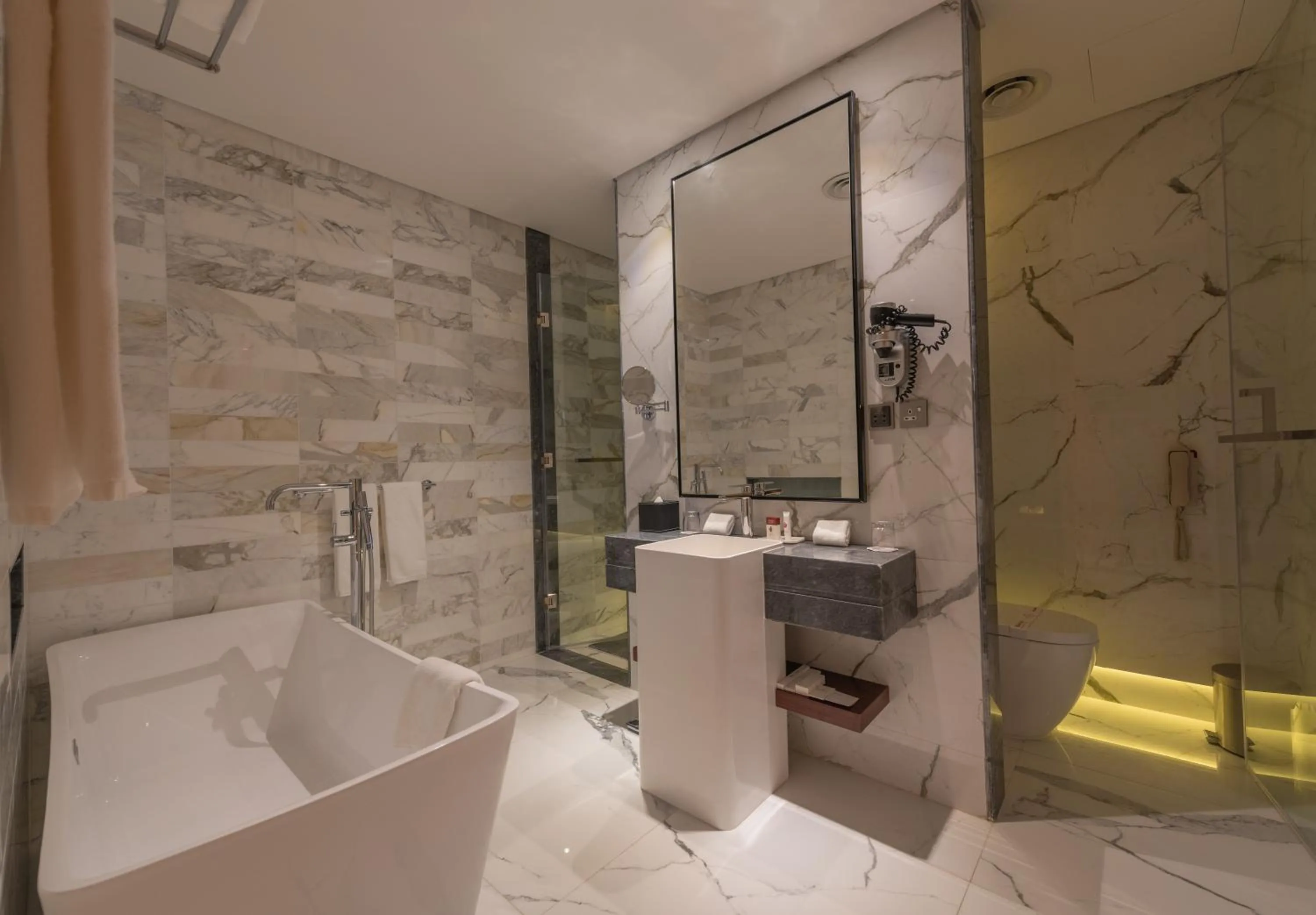 Bathroom in Ramada Hotel & Suites by Wyndham Al Qassim