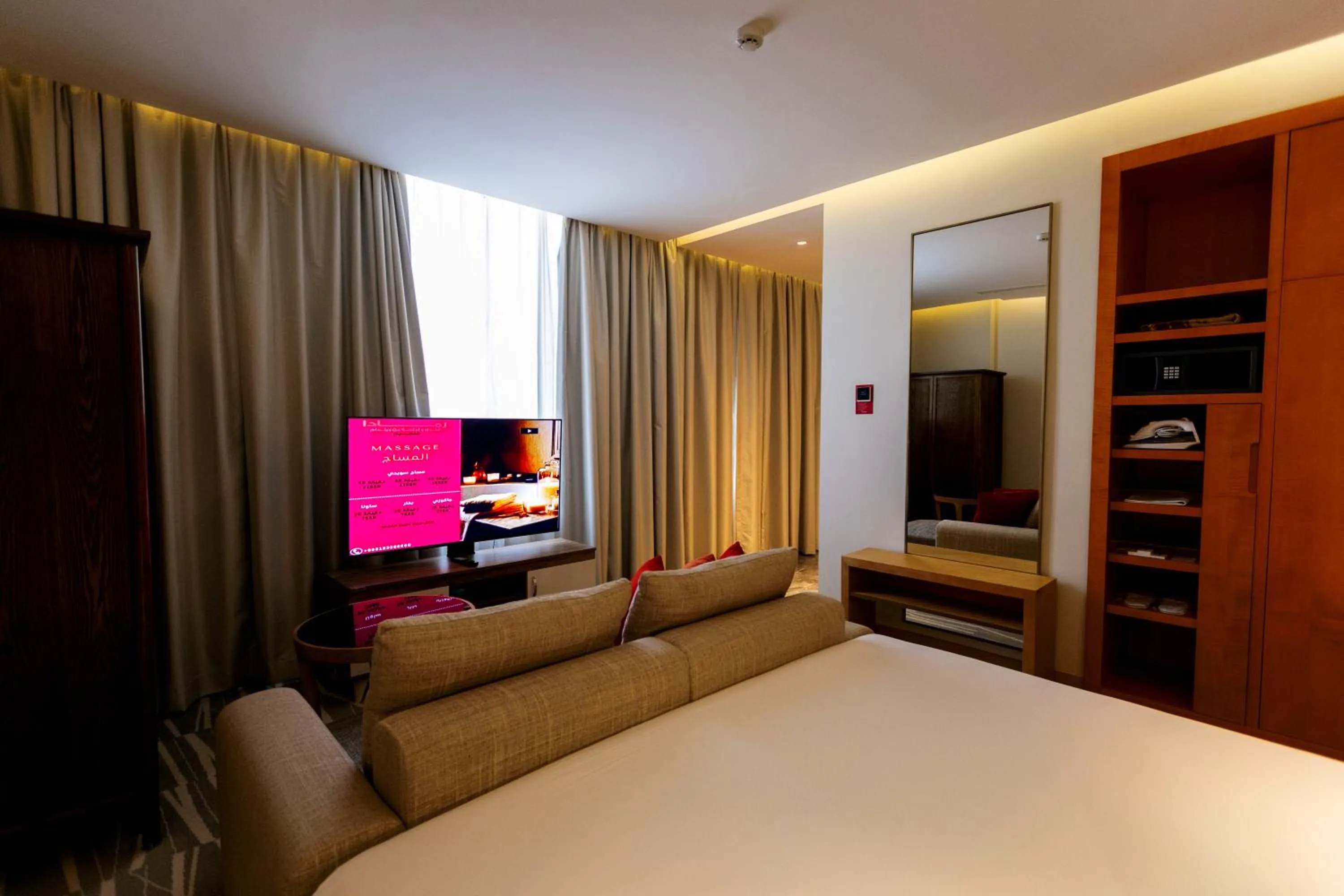 Bedroom, Bed in Ramada Hotel & Suites by Wyndham Al Qassim