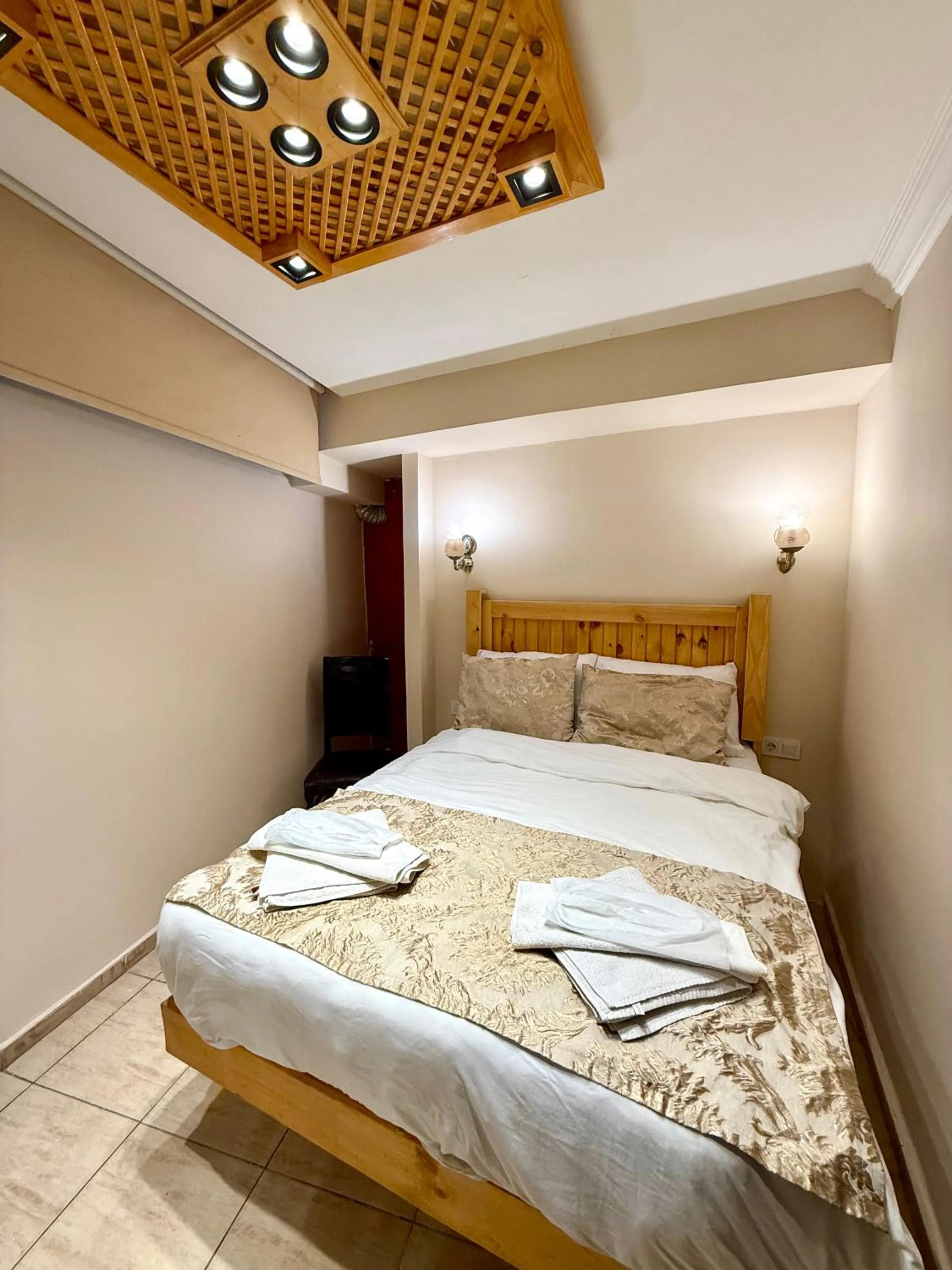 Bed in Magnificent Hotel