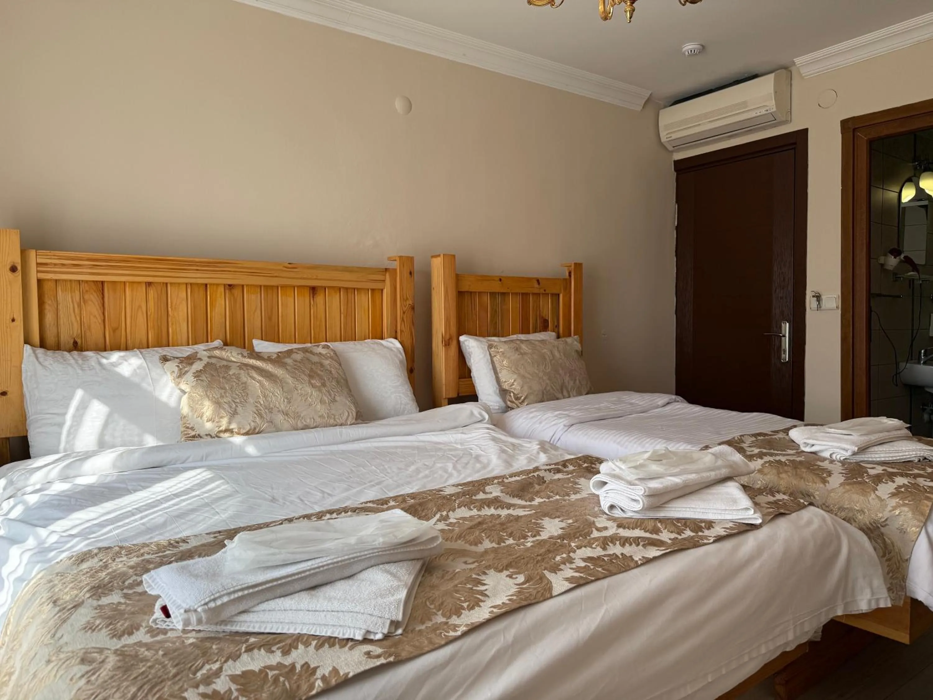 Bed in Magnificent Hotel