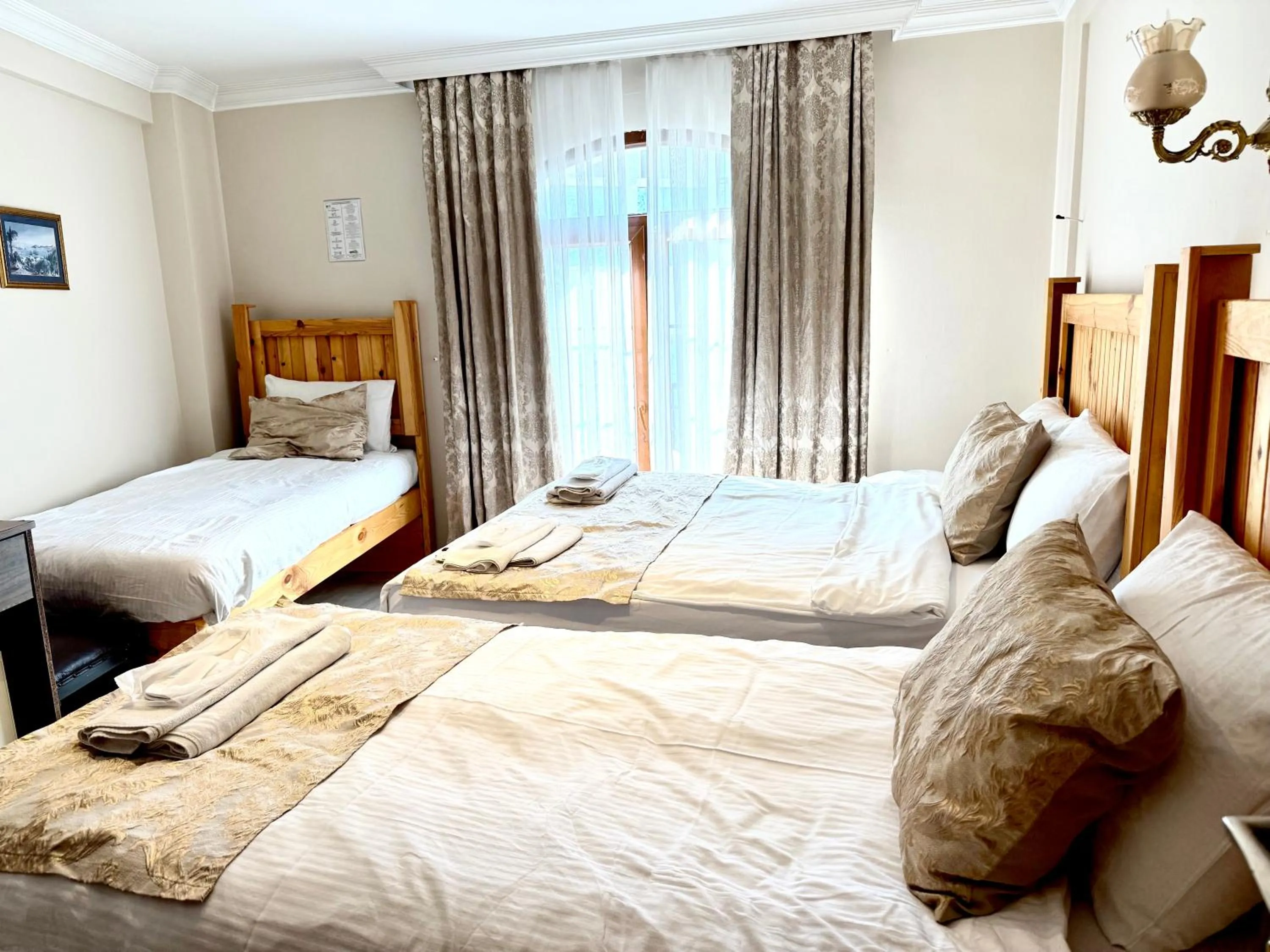 Bed in Magnificent Hotel