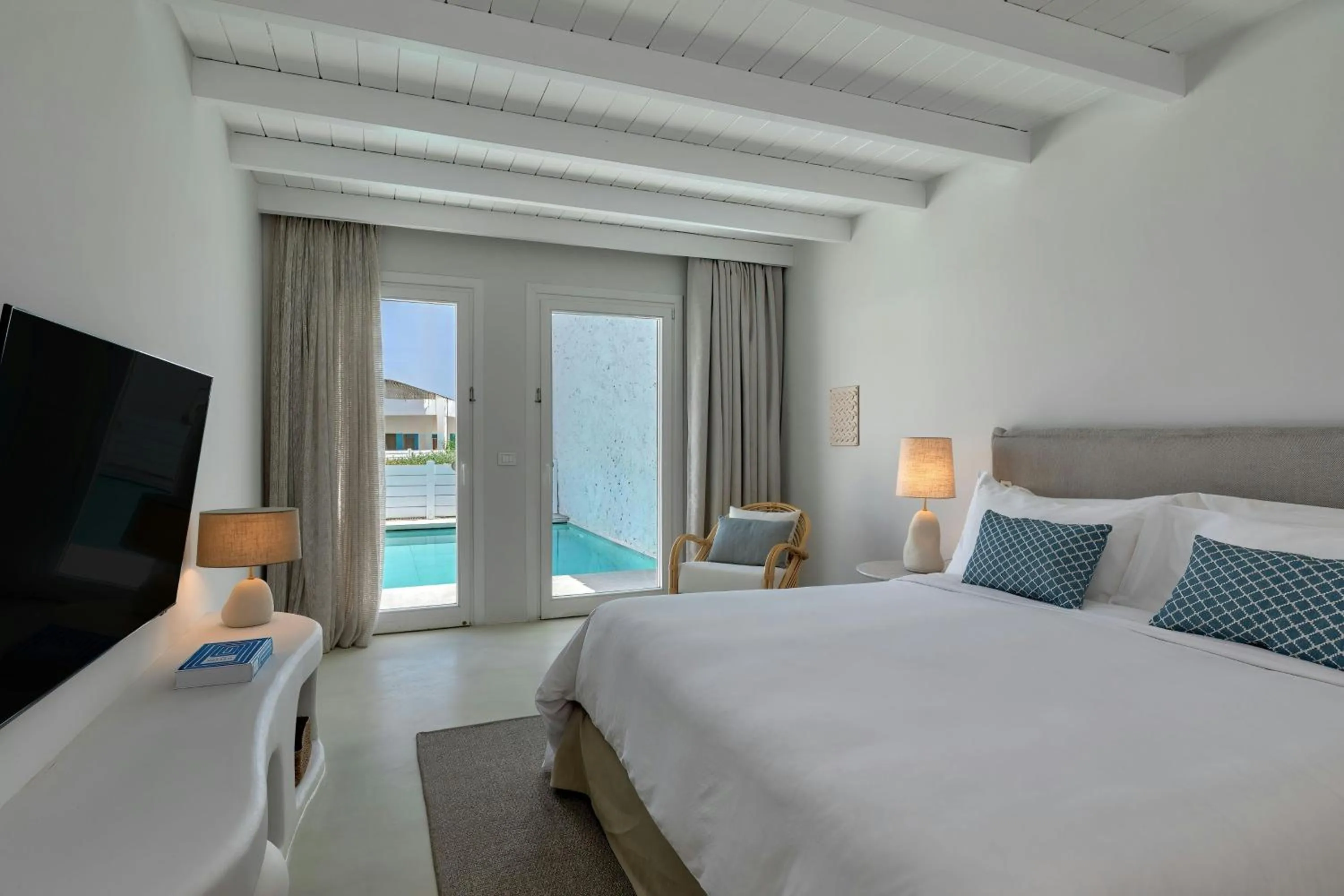 Swimming pool, Bed in Patmos Aktis, a Luxury Collection Resort & Spa, Greece