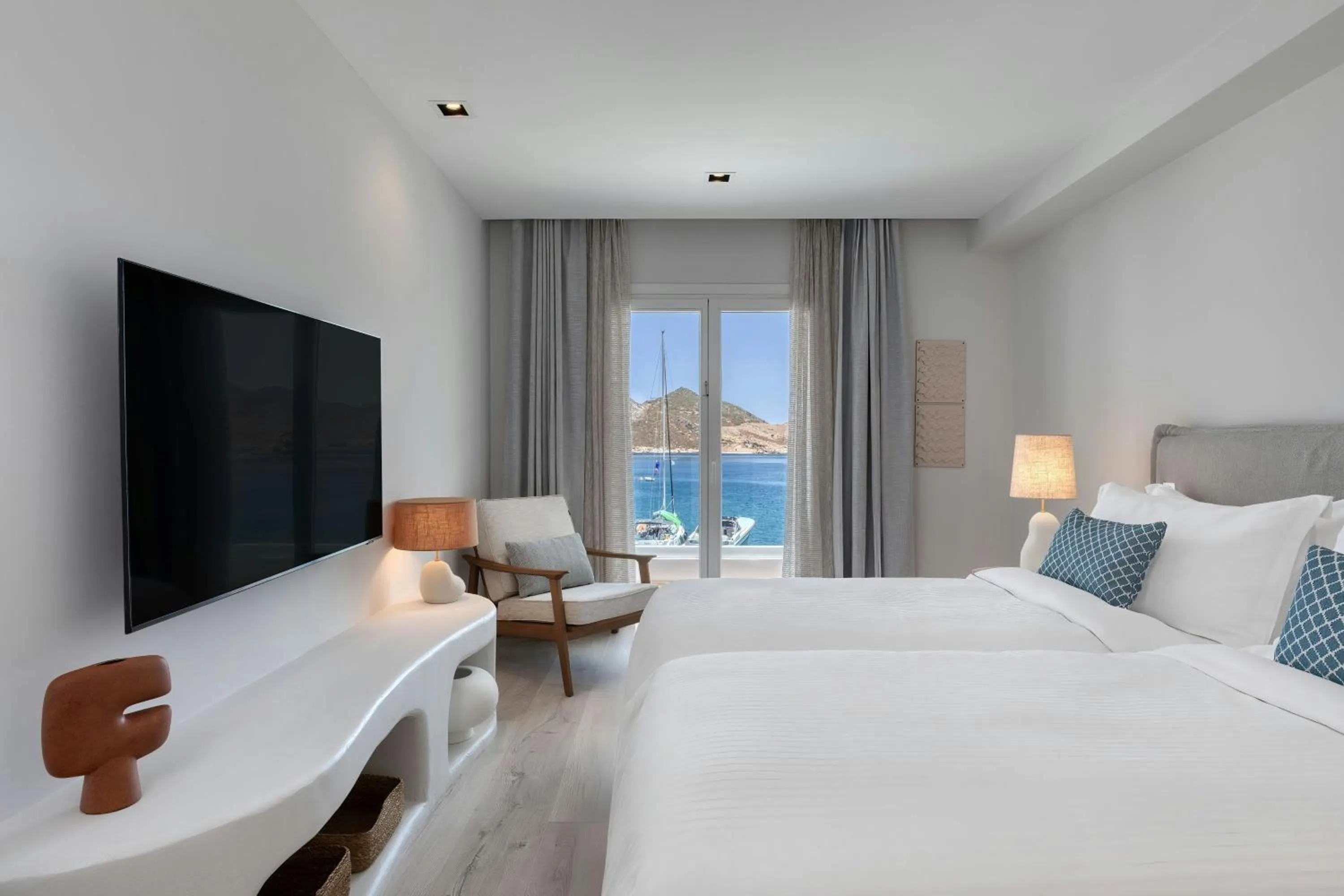 Bedroom, Bed in Patmos Aktis, a Luxury Collection Resort & Spa, Greece