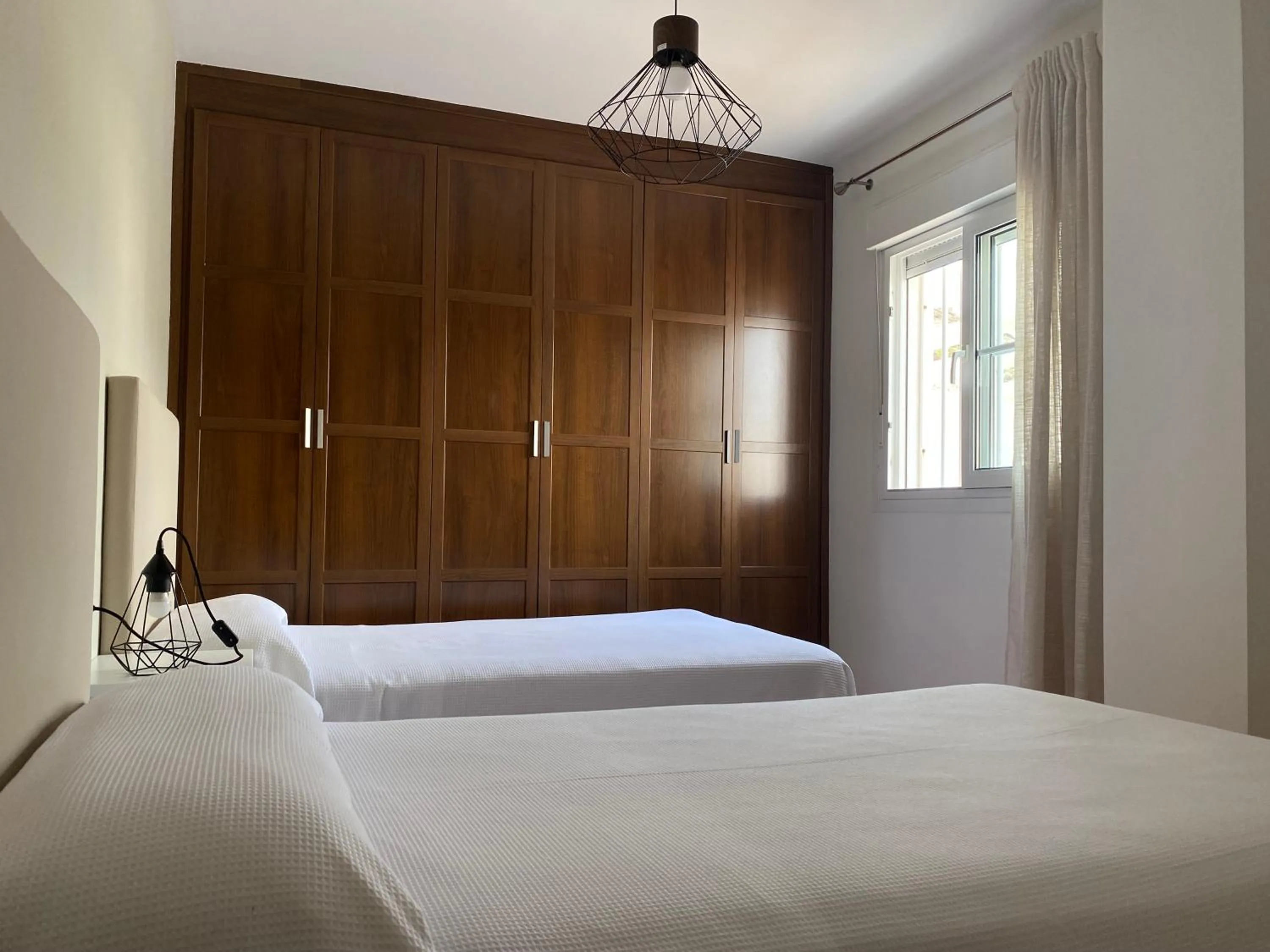 Bedroom, Bed in Apartahotel Vistamar San José