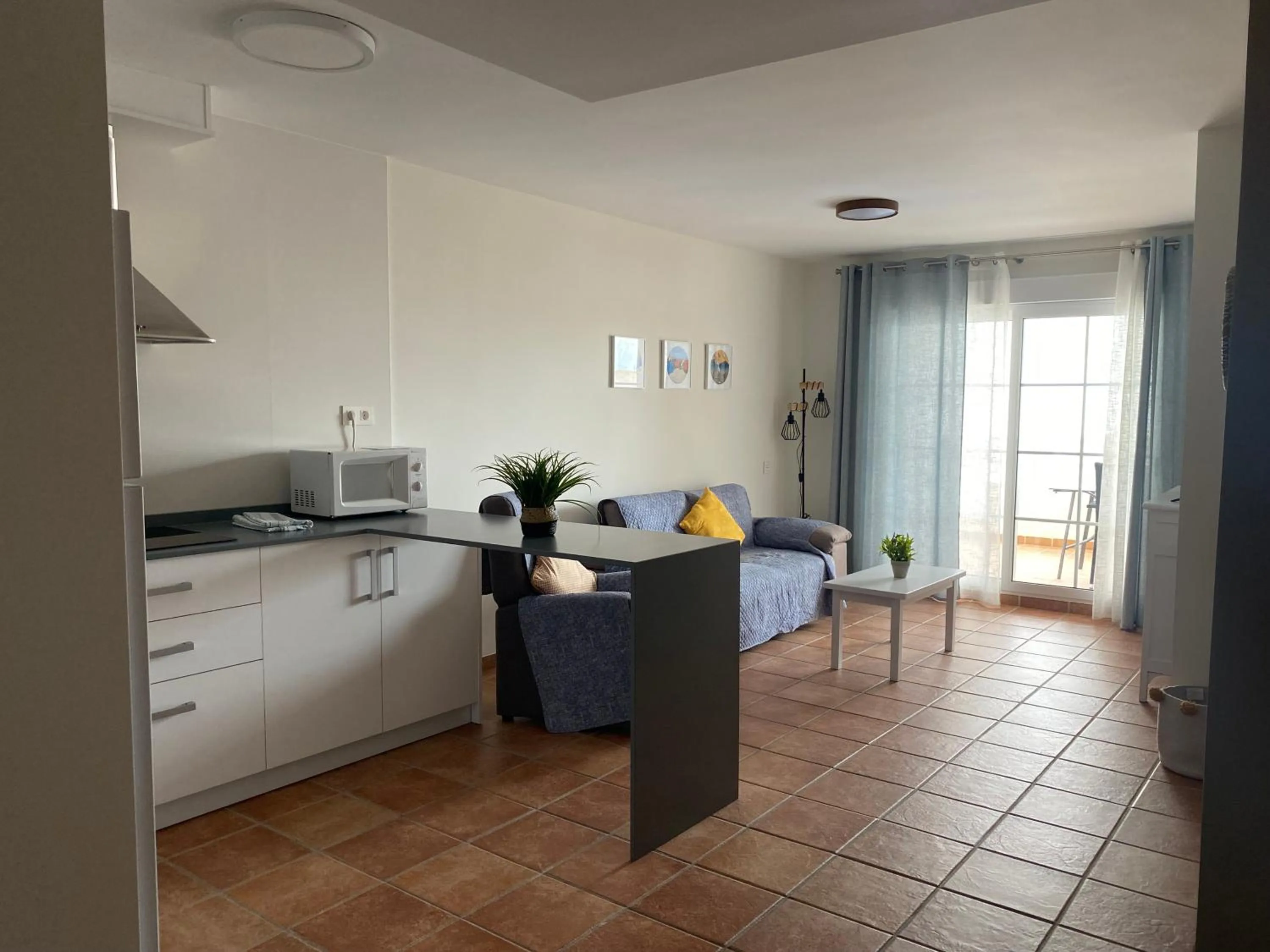 Kitchen or kitchenette in Apartahotel Vistamar San José