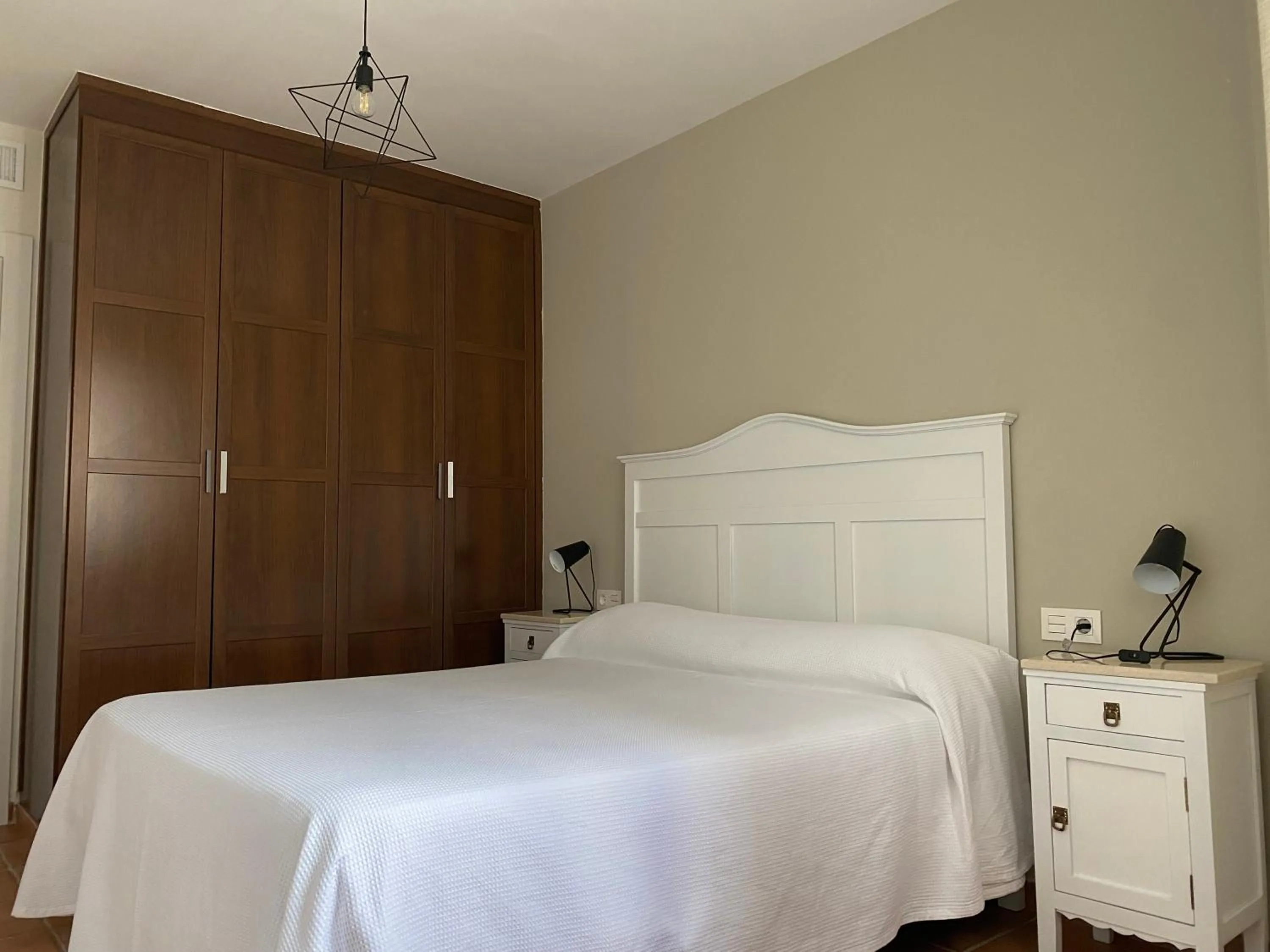 Bedroom, Bed in Apartahotel Vistamar San José