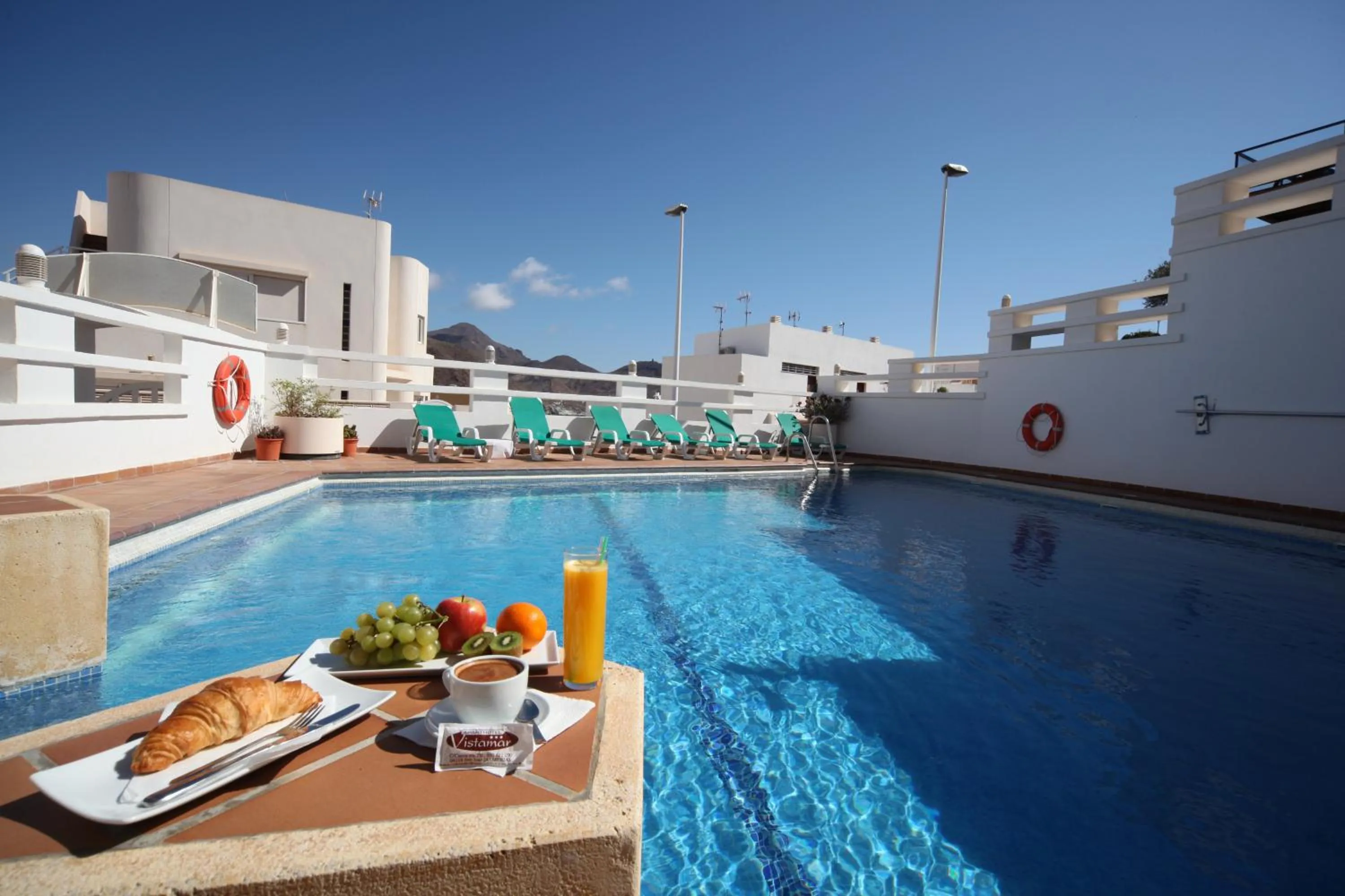 Swimming pool in Apartahotel Vistamar San José