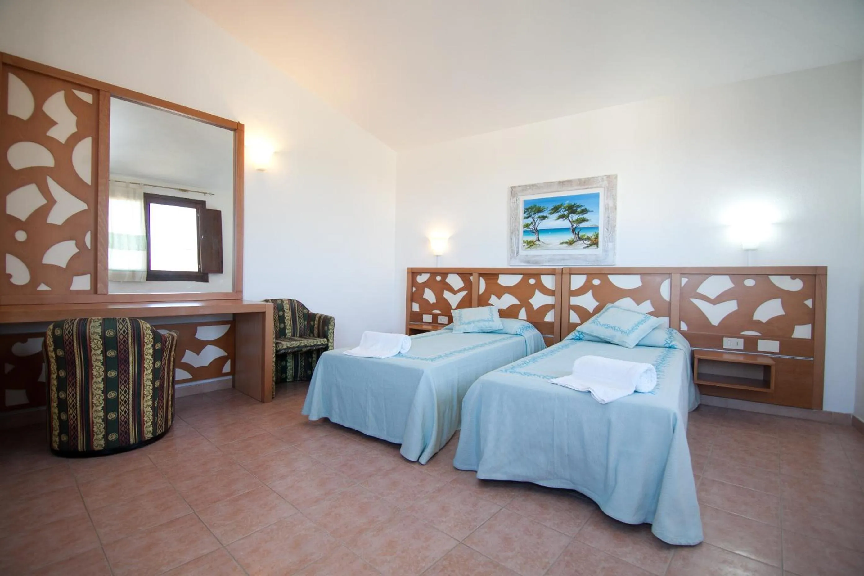 Photo of the whole room, Bed in Club Esse Gallura