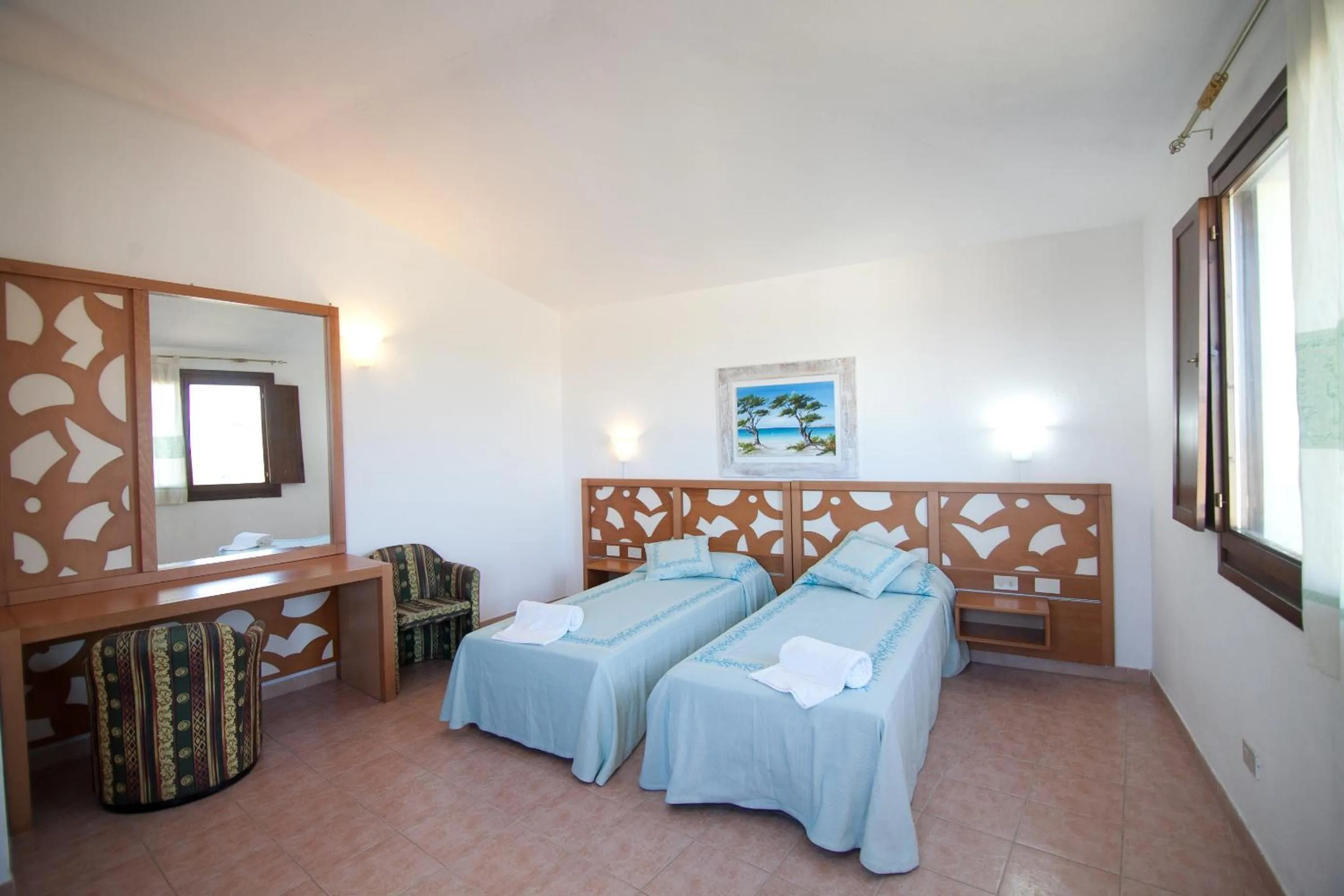 Photo of the whole room, Bed in Club Esse Gallura