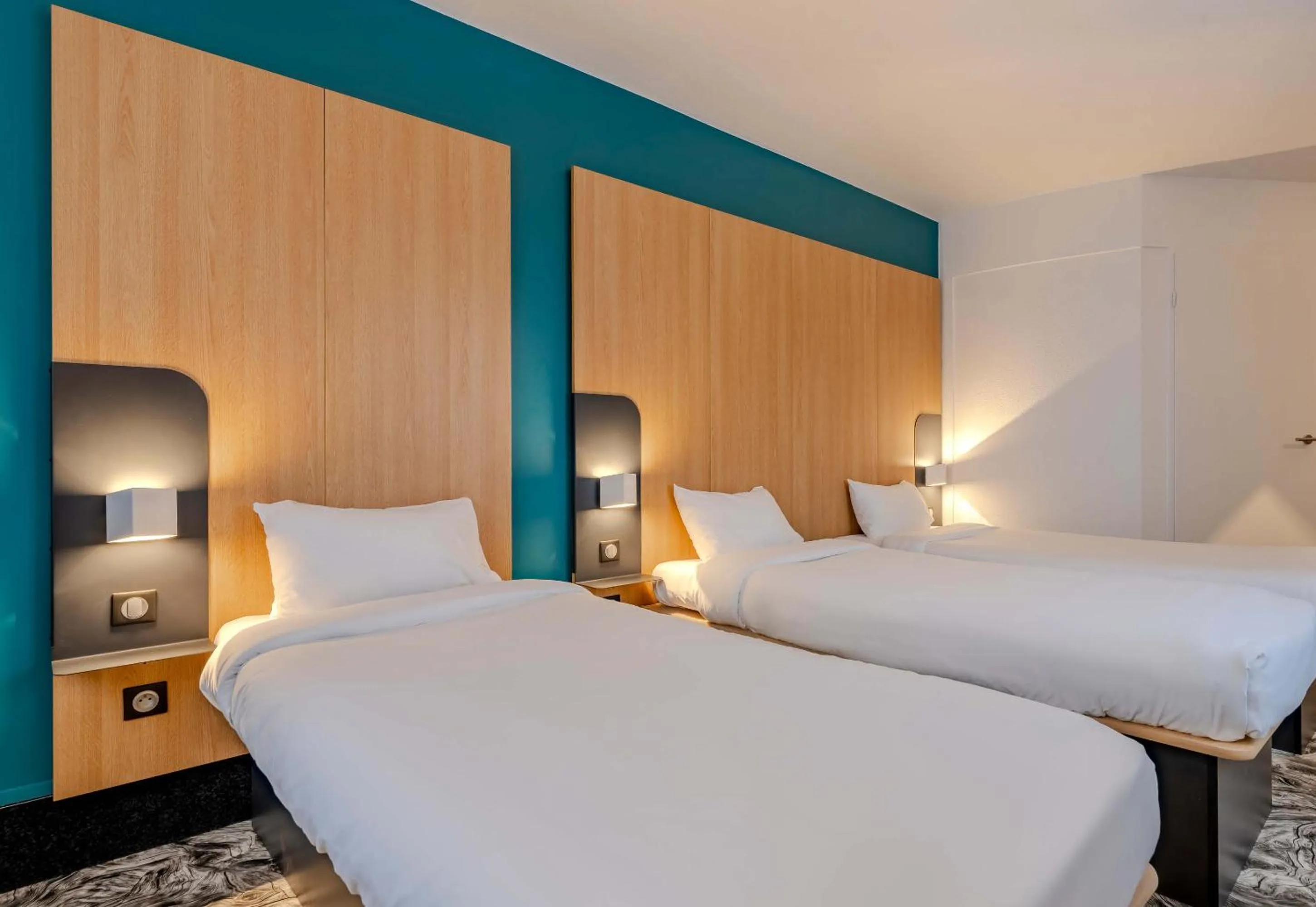 Bed in B&B HOTEL Maubeuge-Louvroil