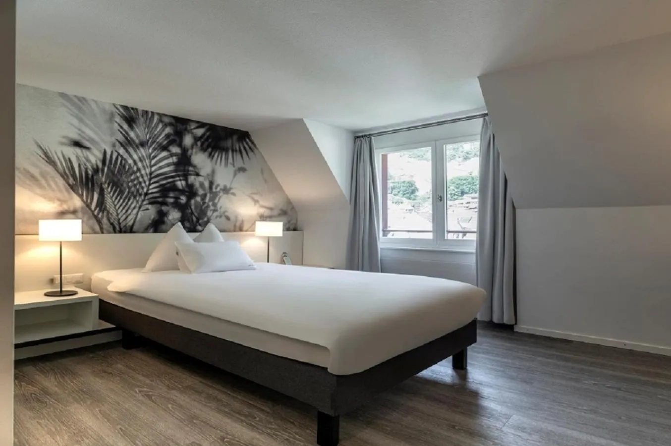 Bed in Hotel Vitznauerhof - Lifestyle Hideaway at Lake Lucerne