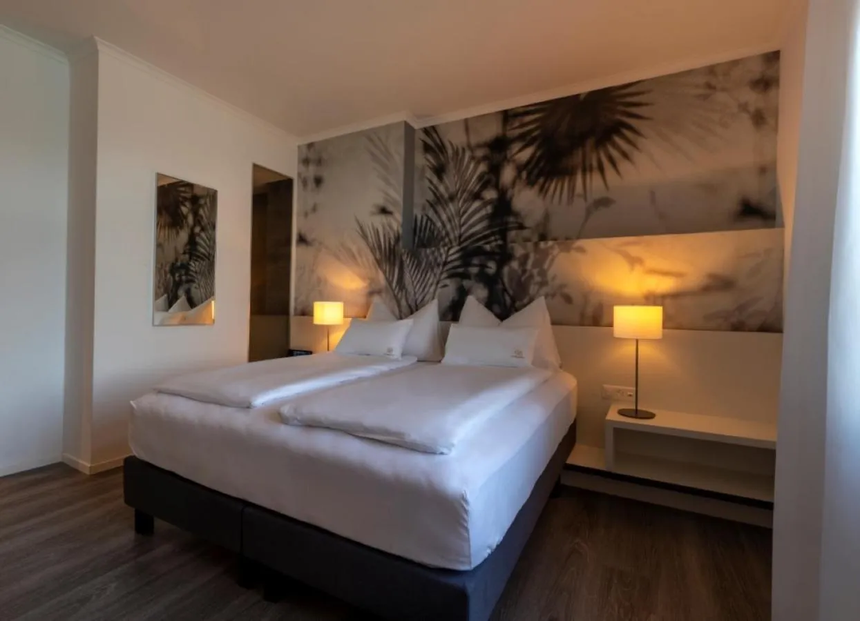 Bed in Hotel Vitznauerhof - Lifestyle Hideaway at Lake Lucerne