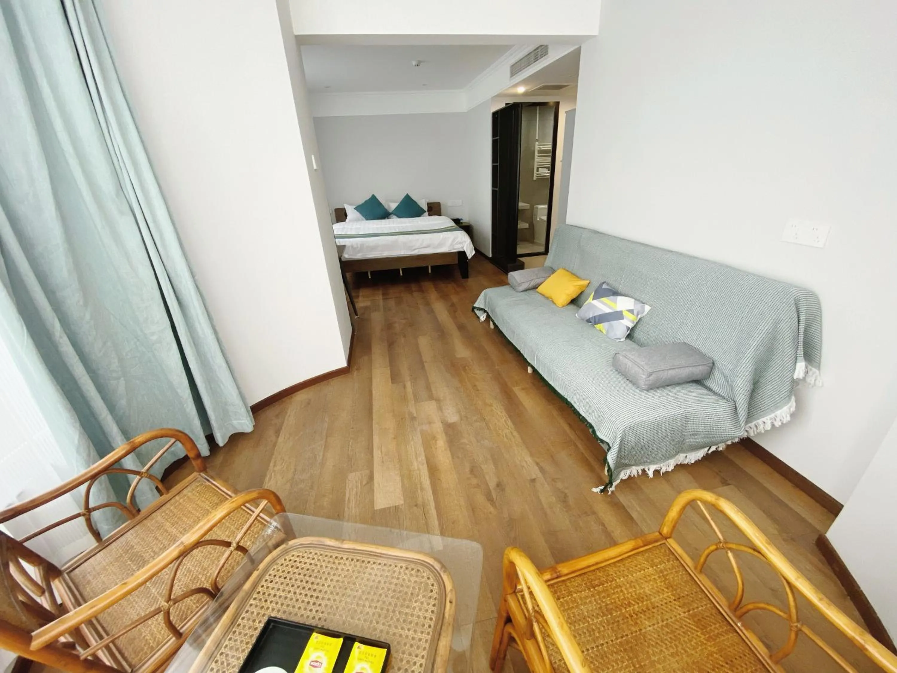 Seating area, Bed in Beijing RJ Brown city center hotel Forbidden City &Tian'anmen Square ,Near Subway line 8, 3min walk to Temple of Heaven, English Speaking reception , Laundry service ,Free wifi ,Oneday tour to Greatwall