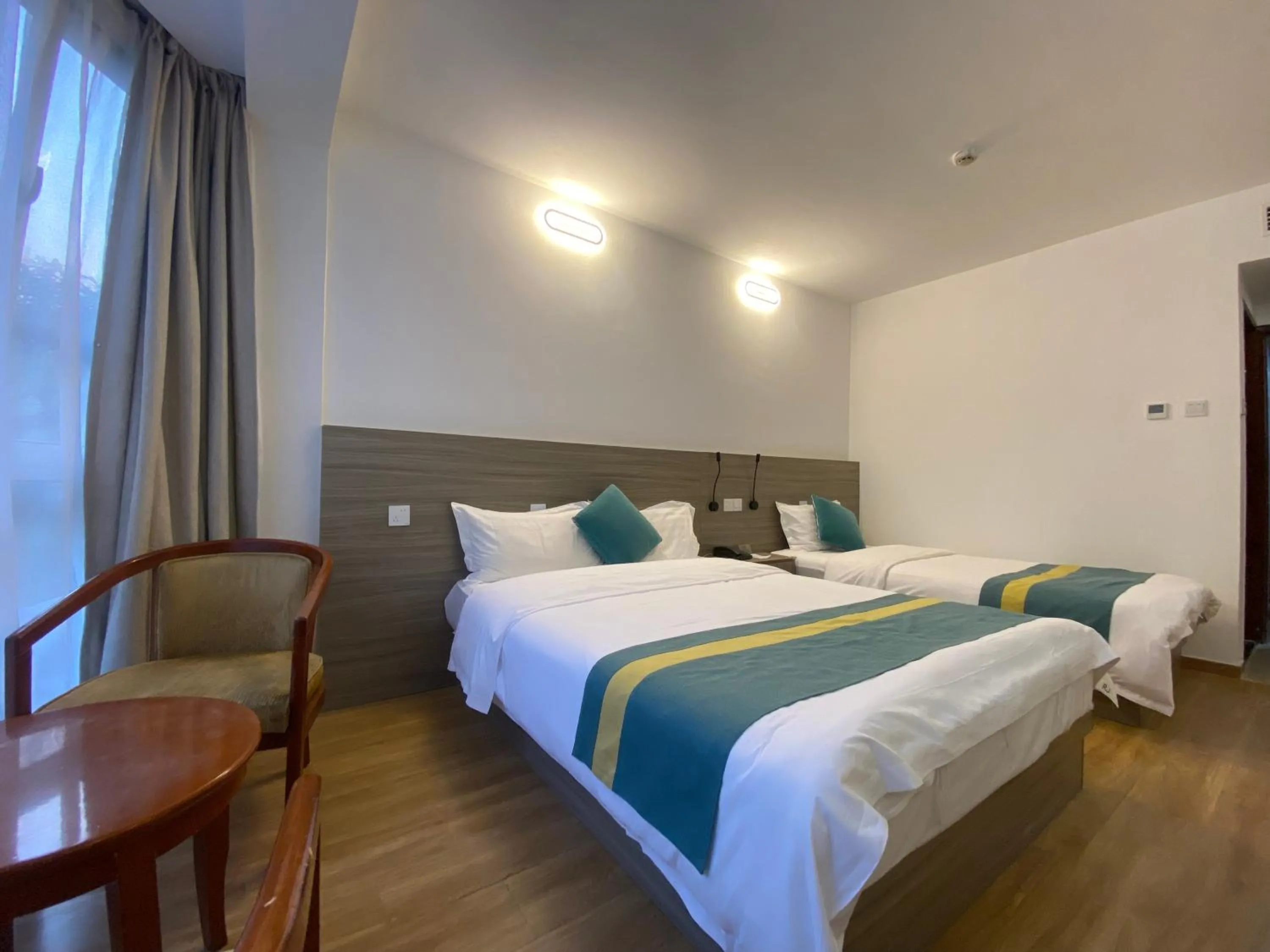 Bed in Beijing RJ Brown city center hotel Forbidden City &Tian'anmen Square ,Near Subway line 8, 3min walk to Temple of Heaven, English Speaking reception , Laundry service ,Free wifi ,Oneday tour to Greatwall