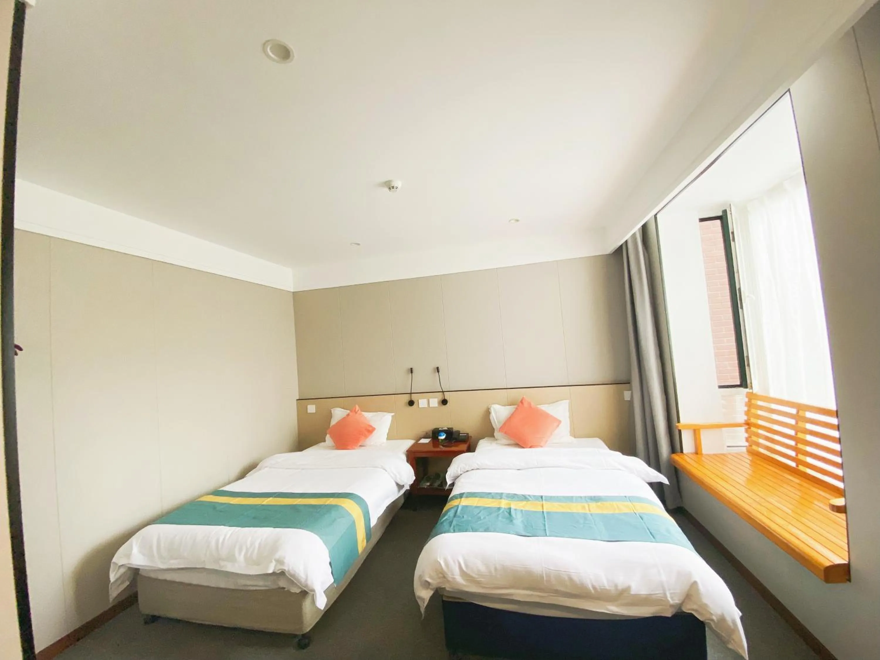 Bed in Beijing RJ Brown city center hotel Forbidden City &Tian'anmen Square ,Near Subway line 8, 3min walk to Temple of Heaven, English Speaking reception , Laundry service ,Free wifi ,Oneday tour to Greatwall
