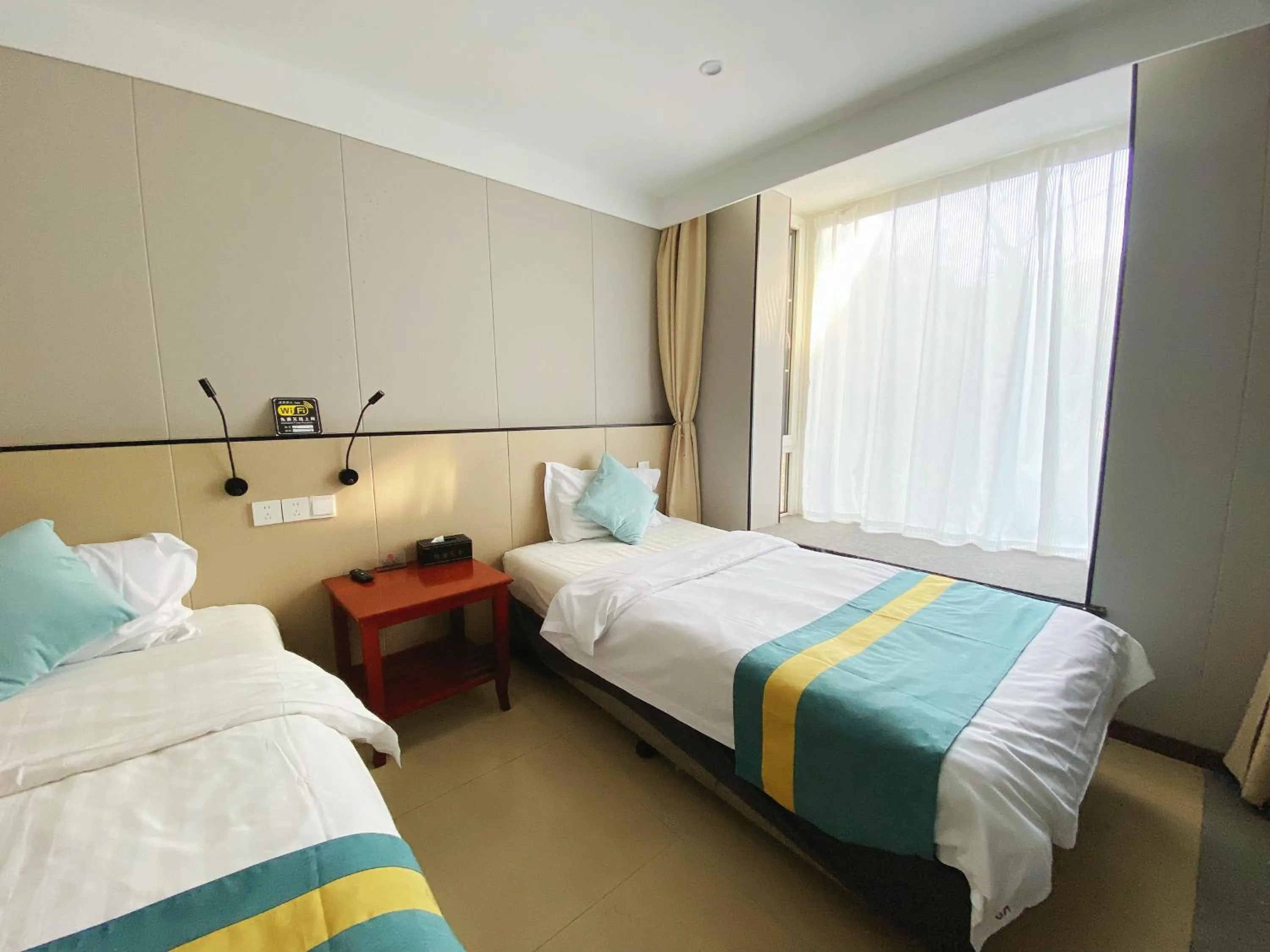 Bed in Beijing RJ Brown city center hotel Forbidden City &Tian'anmen Square ,Near Subway line 8, 3min walk to Temple of Heaven, English Speaking reception , Laundry service ,Free wifi ,Oneday tour to Greatwall