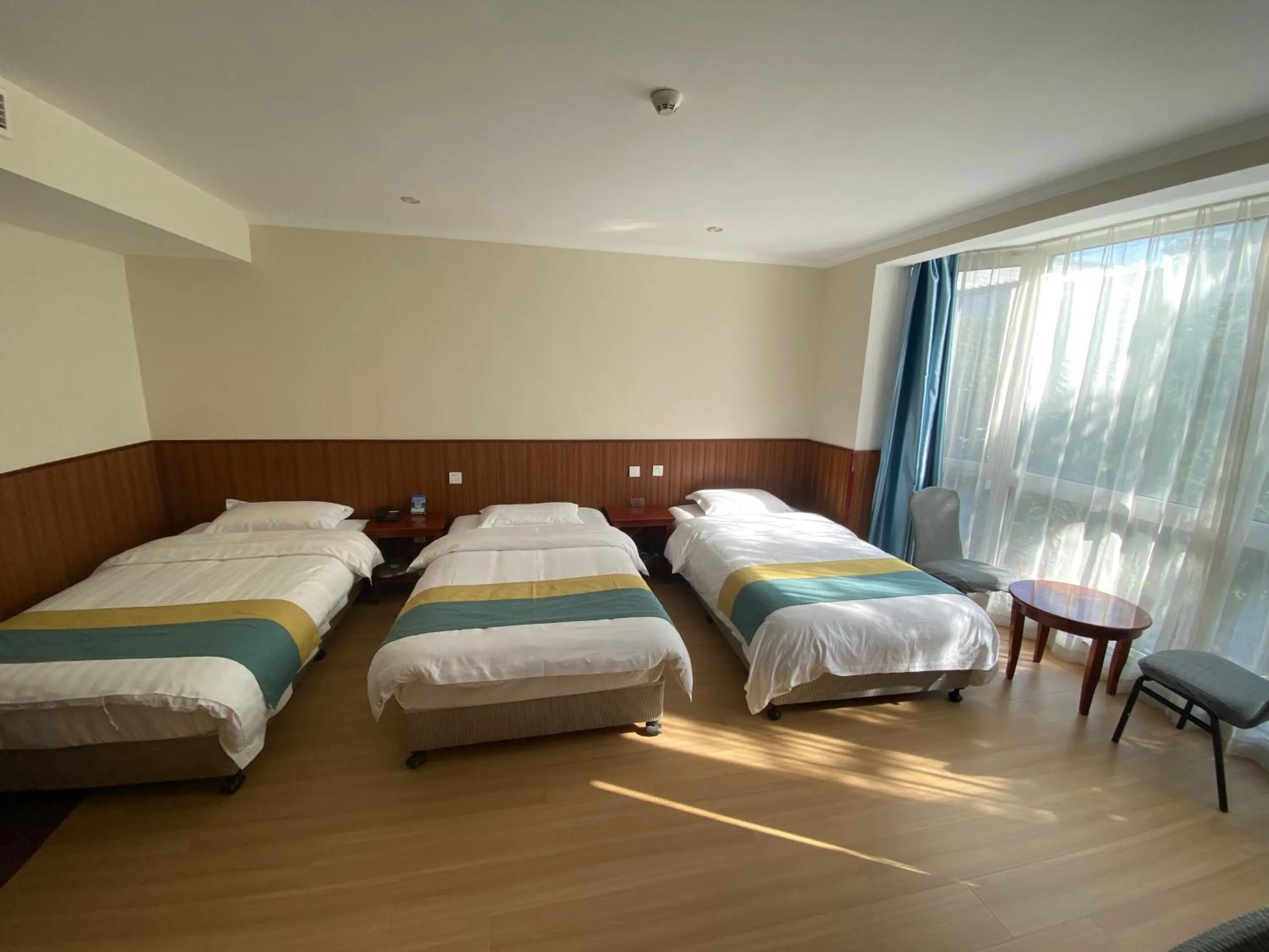 Bed in Beijing RJ Brown city center hotel Forbidden City &Tian'anmen Square ,Near Subway line 8, 3min walk to Temple of Heaven, English Speaking reception , Laundry service ,Free wifi ,Oneday tour to Greatwall