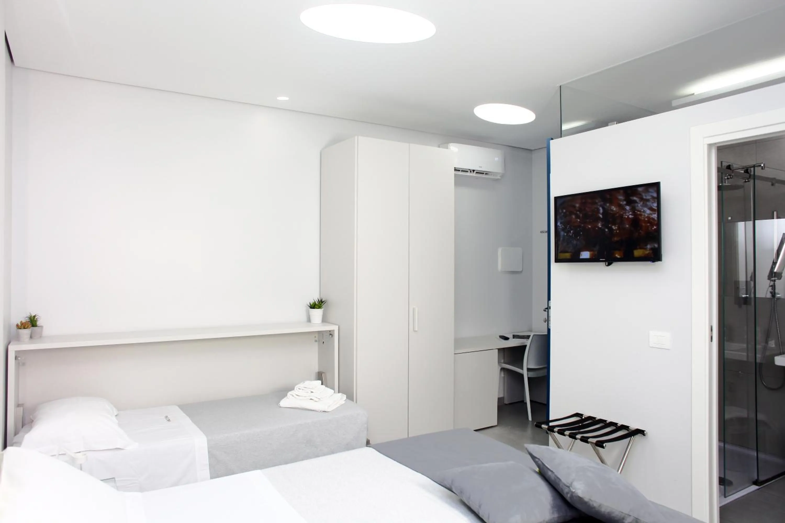 Photo of the whole room, Bed in Rivazzurra Design Rooms