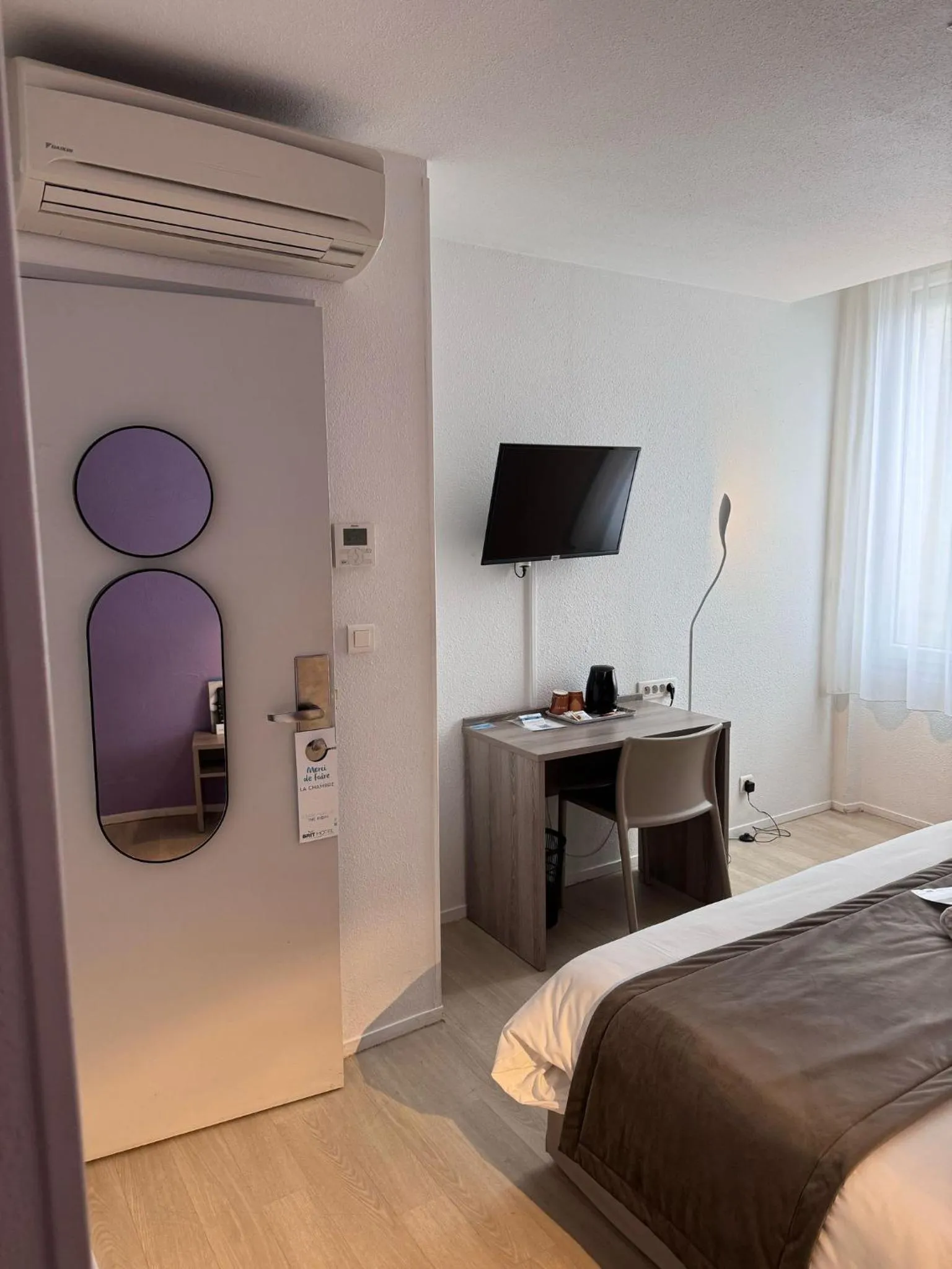 Photo of the whole room, Bed in BRIT HOTEL CONFORT NEVERS Centre Gare