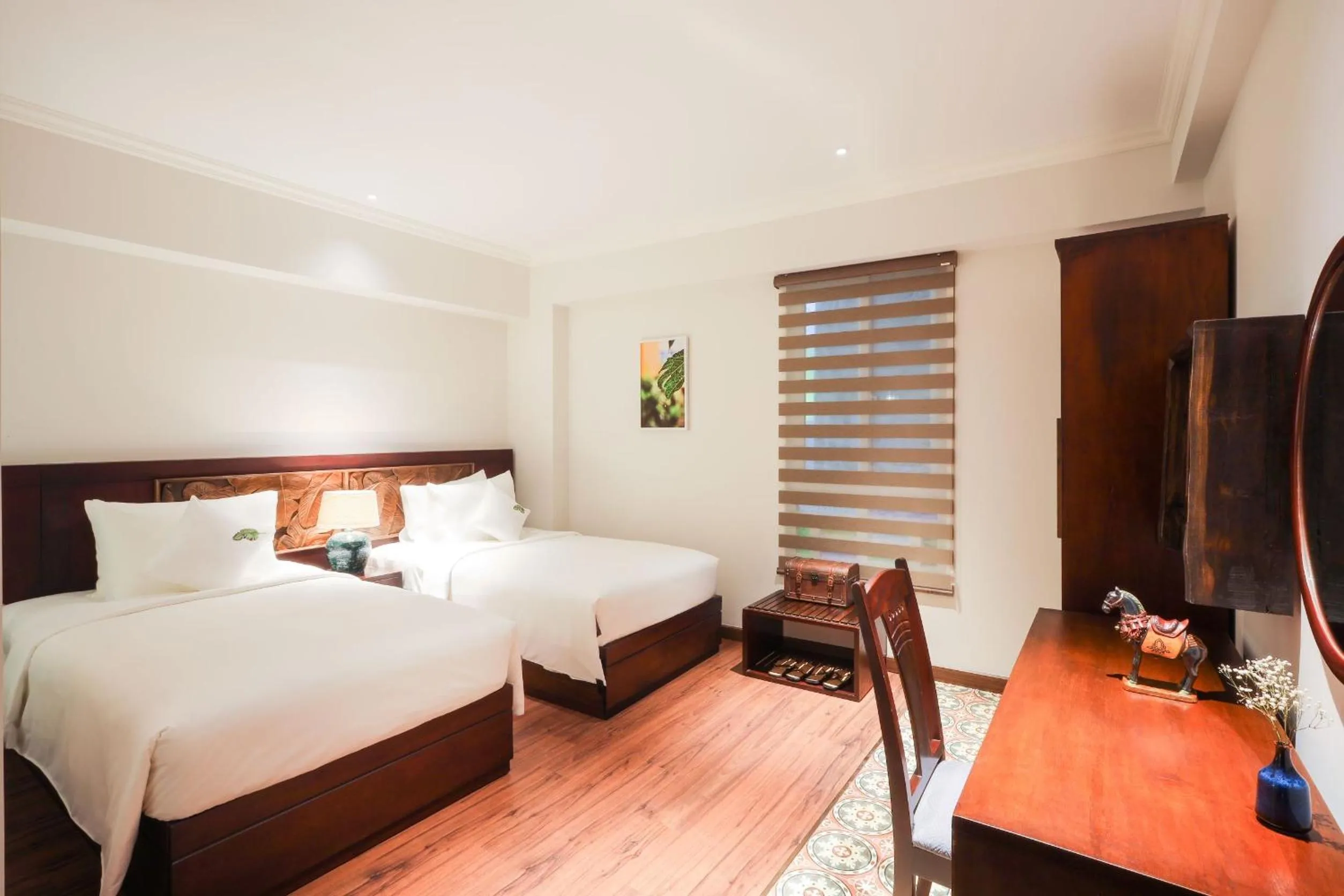 Bed in Cochin Sang Hotel