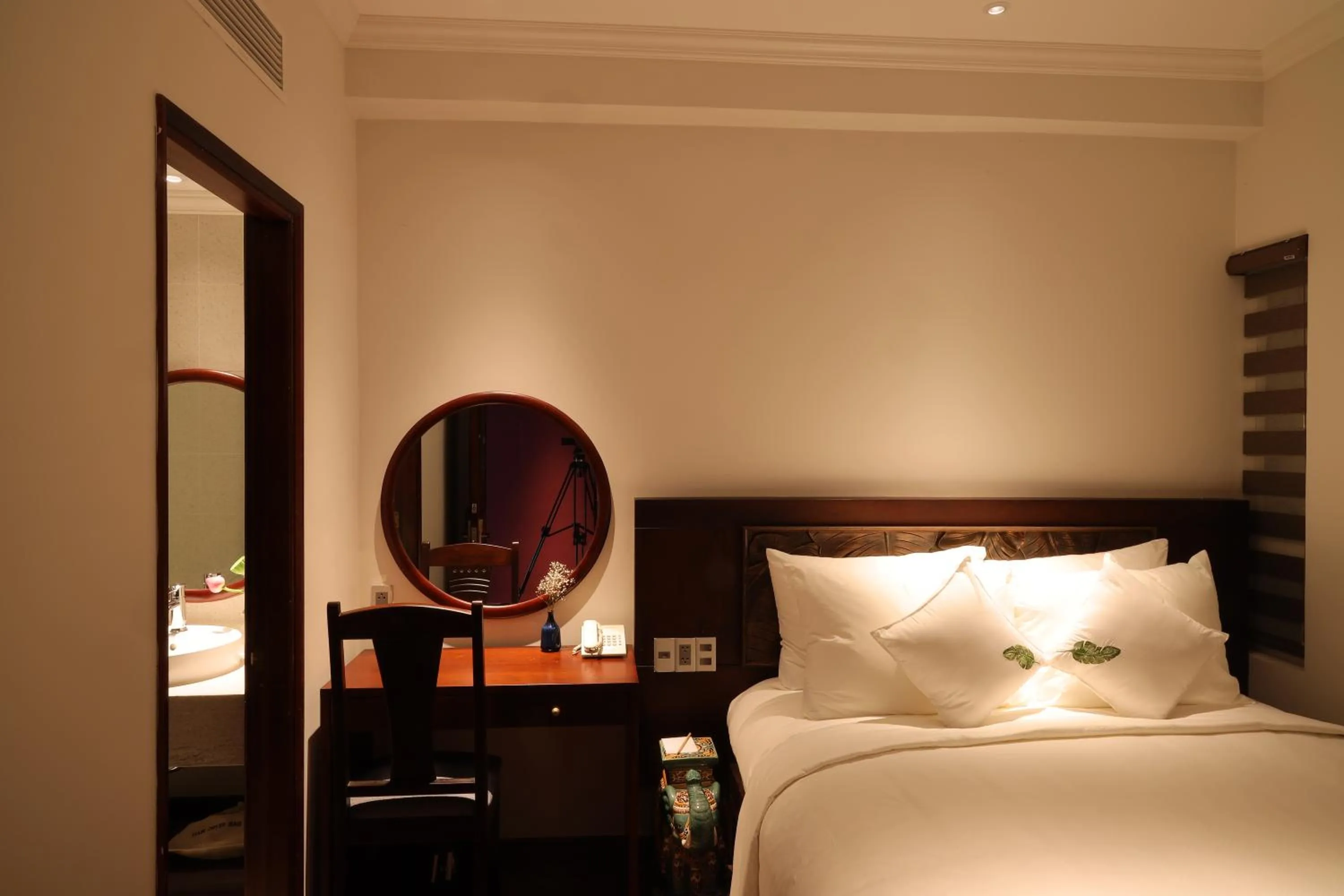 Bed in Cochin Sang Hotel