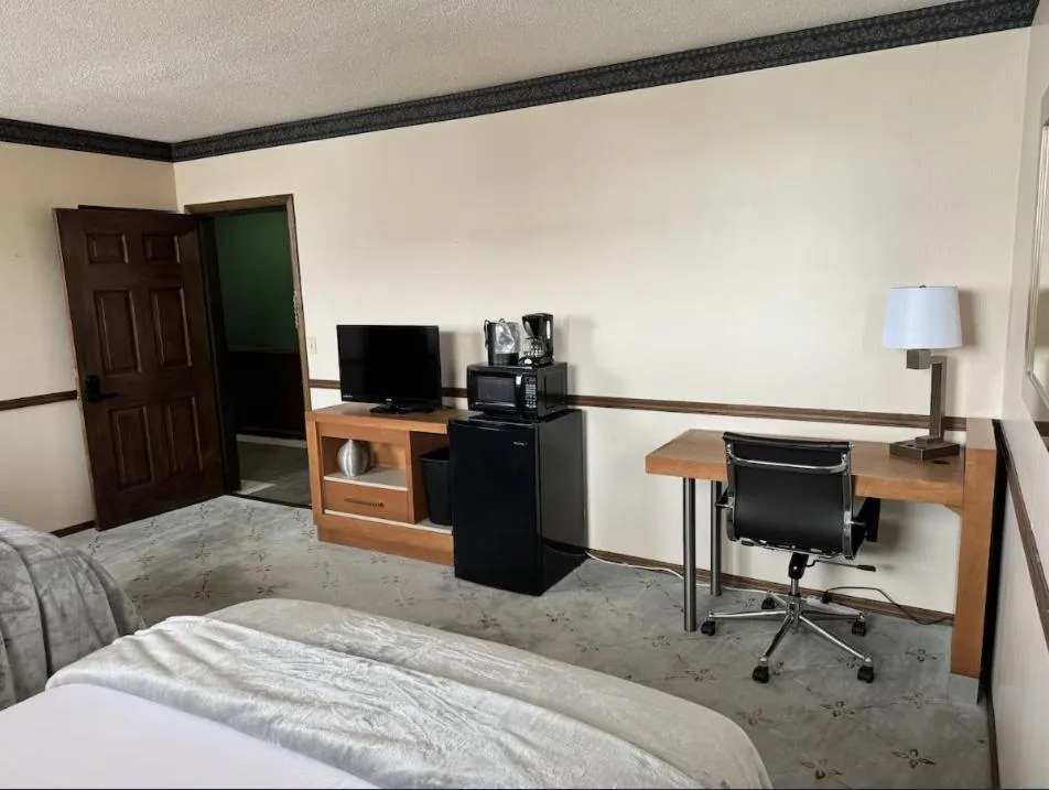 Bed in Fenway House Hotel