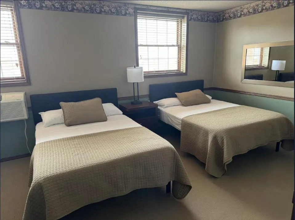 Bed in Fenway House Hotel