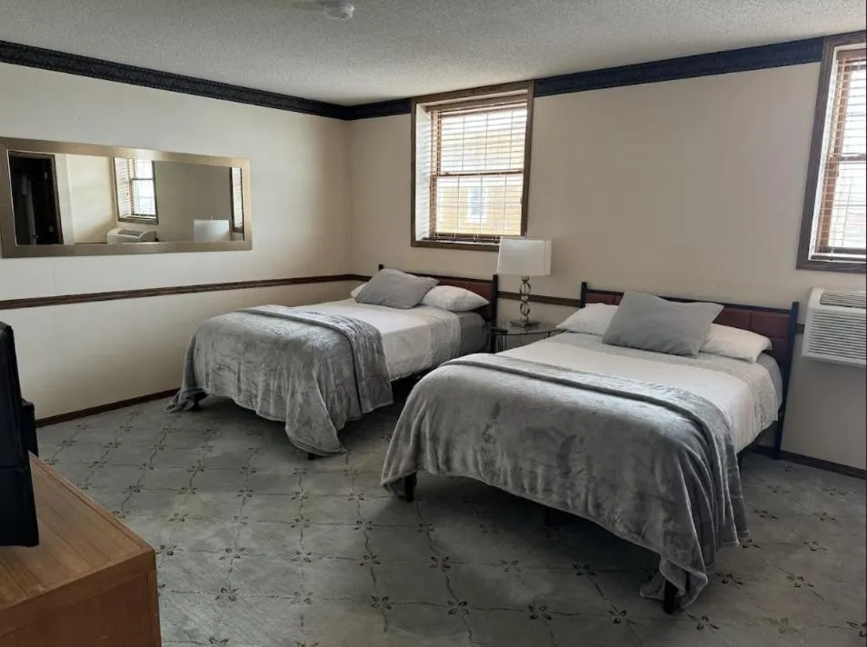 Bed in Fenway House Hotel