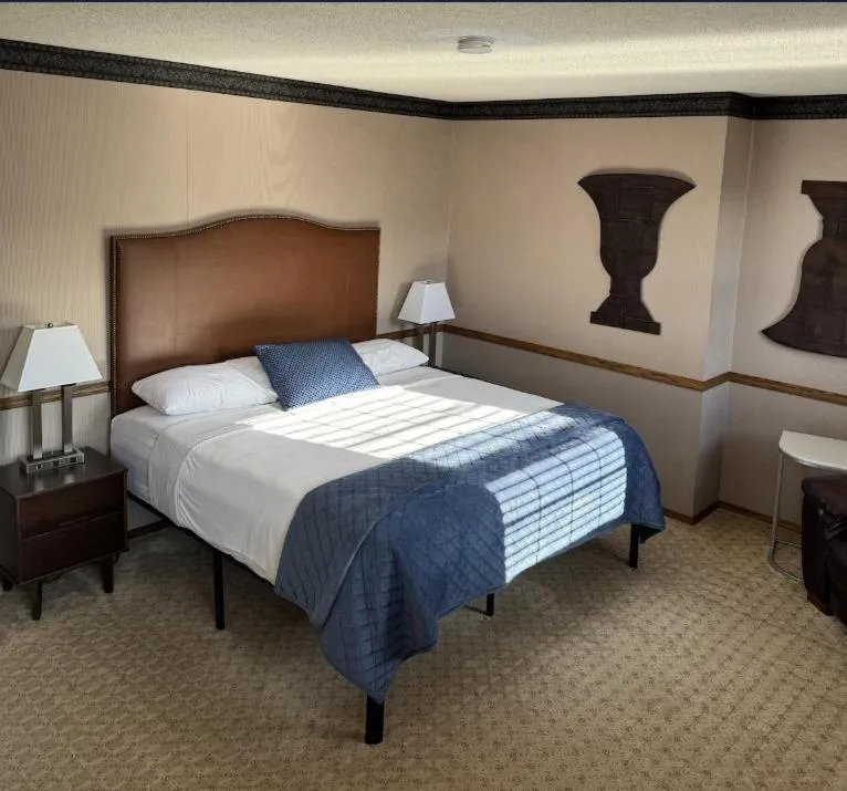 Bed in Fenway House Hotel