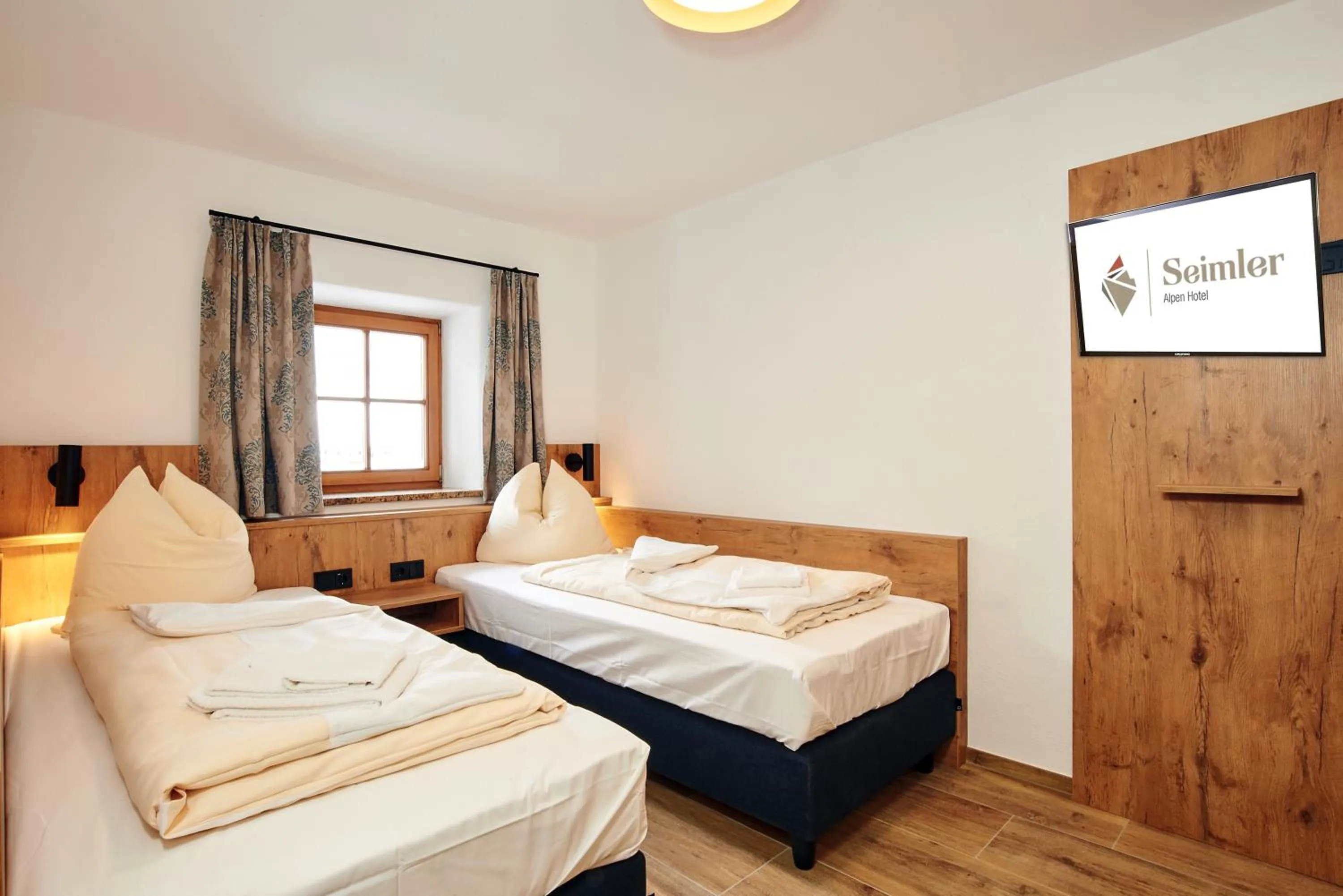 Bed in Alpen-Hotel Seimler