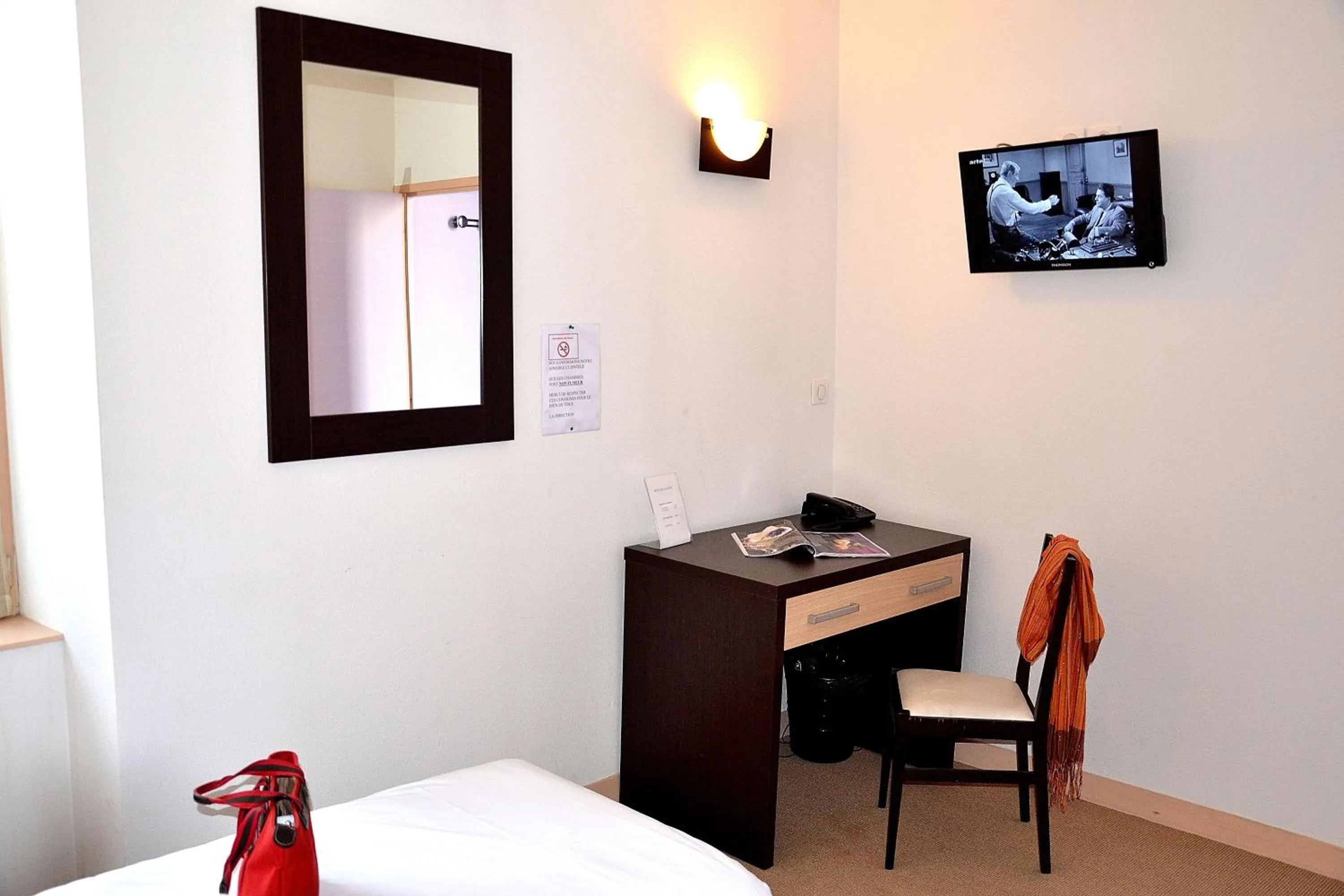 Photo of the whole room, TV/Entertainment Center in Hotel Les Bénédictins