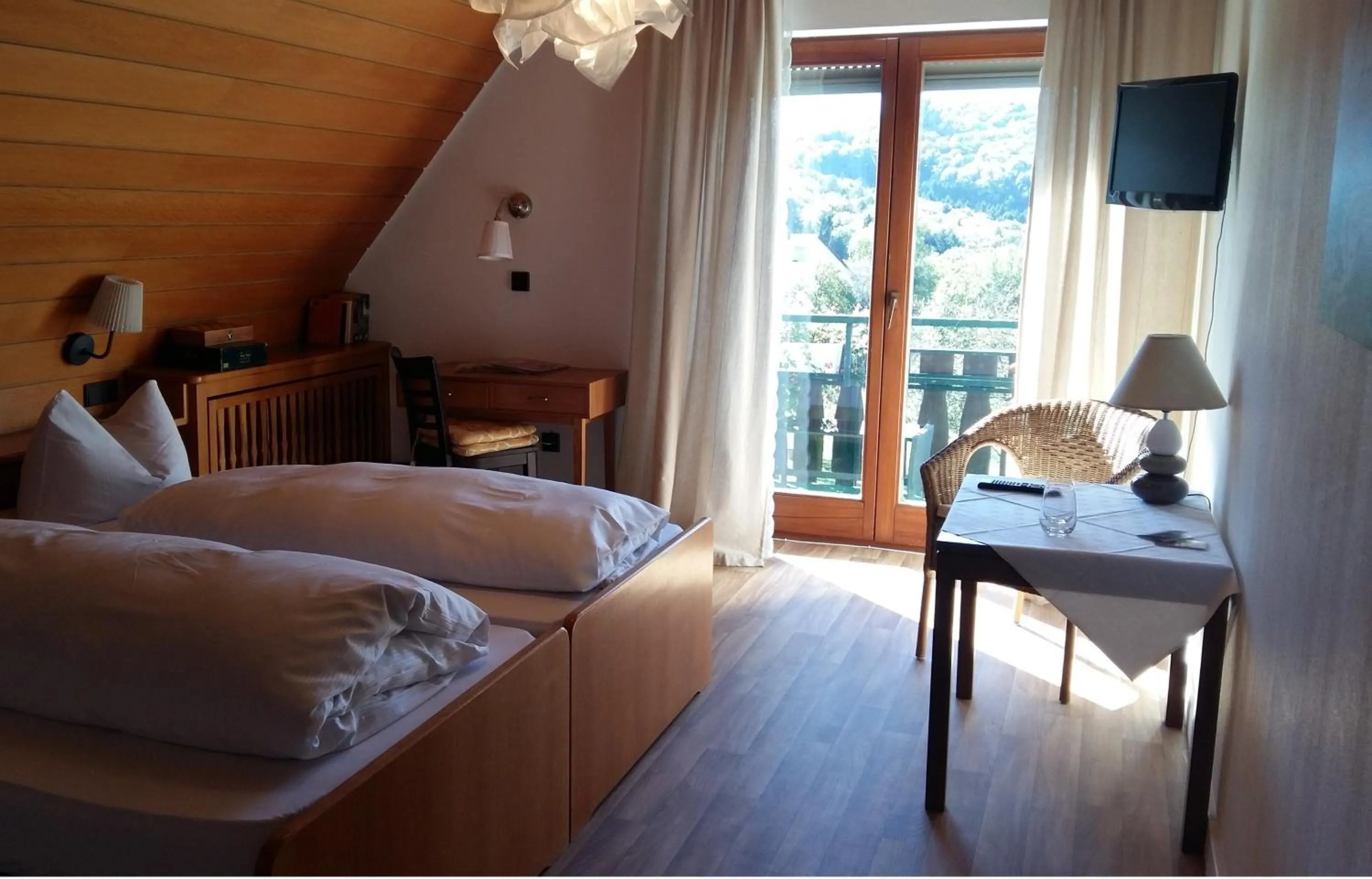 Photo of the whole room, Bed in Landgasthof Grüner Baum