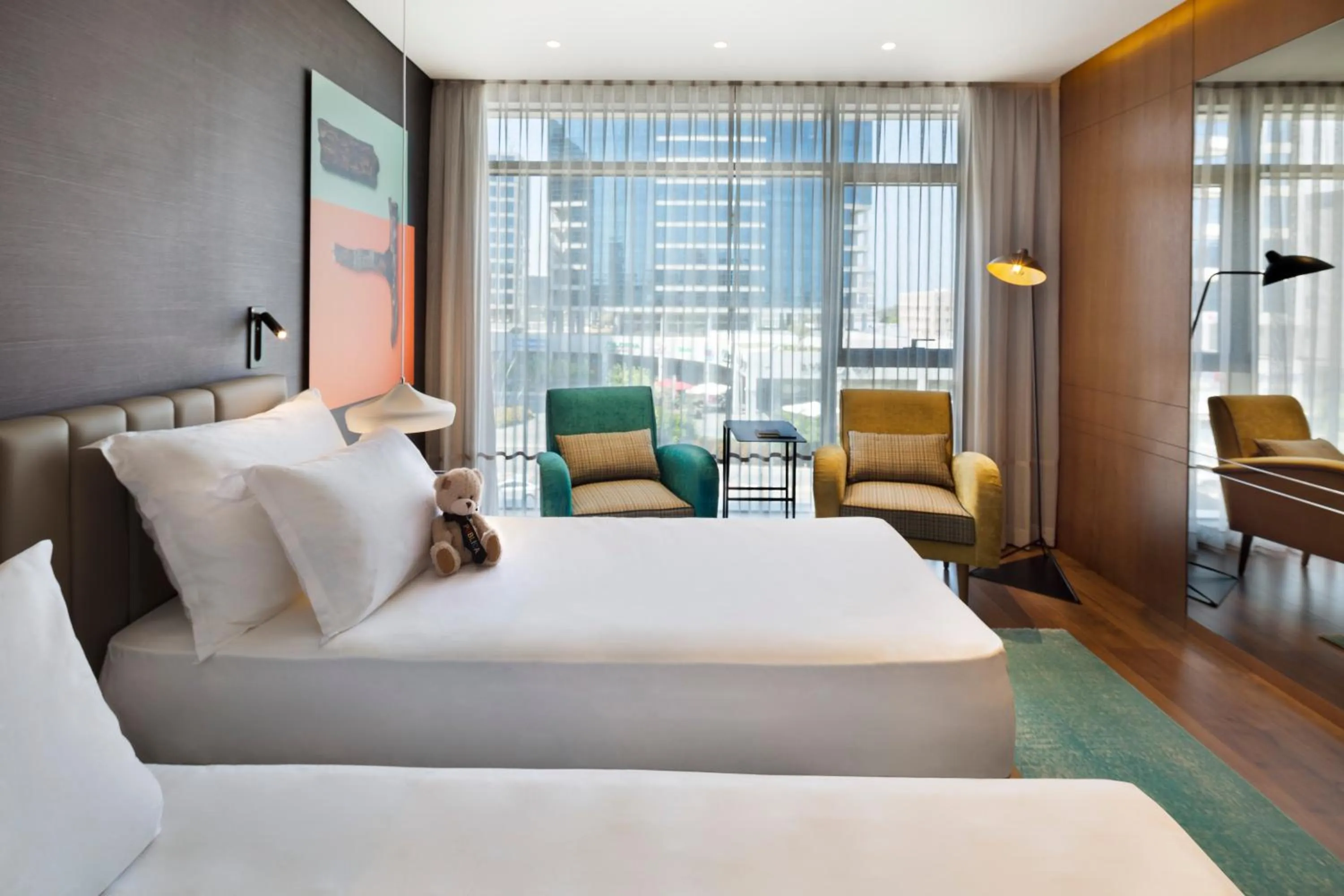 Photo of the whole room, Bed in Publica Isrotel, Autograph Collection