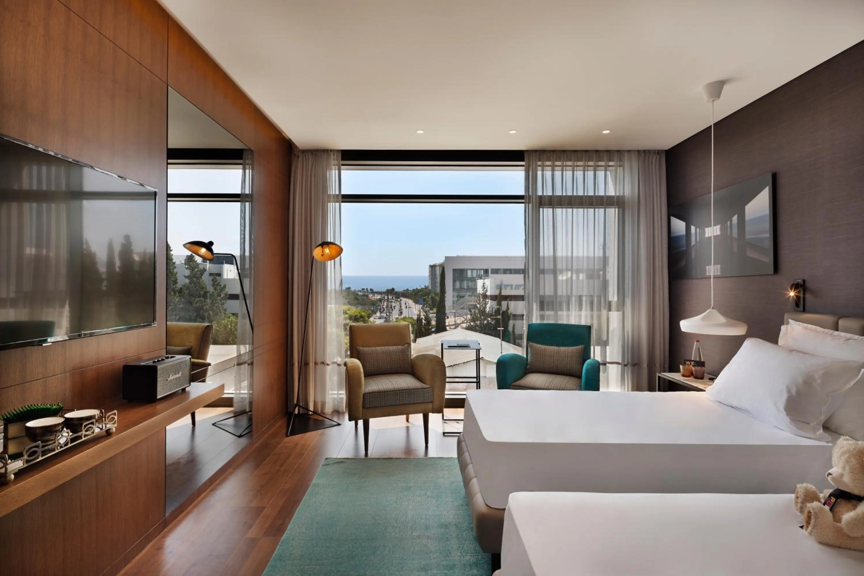 Photo of the whole room, Bed in Publica Isrotel, Autograph Collection