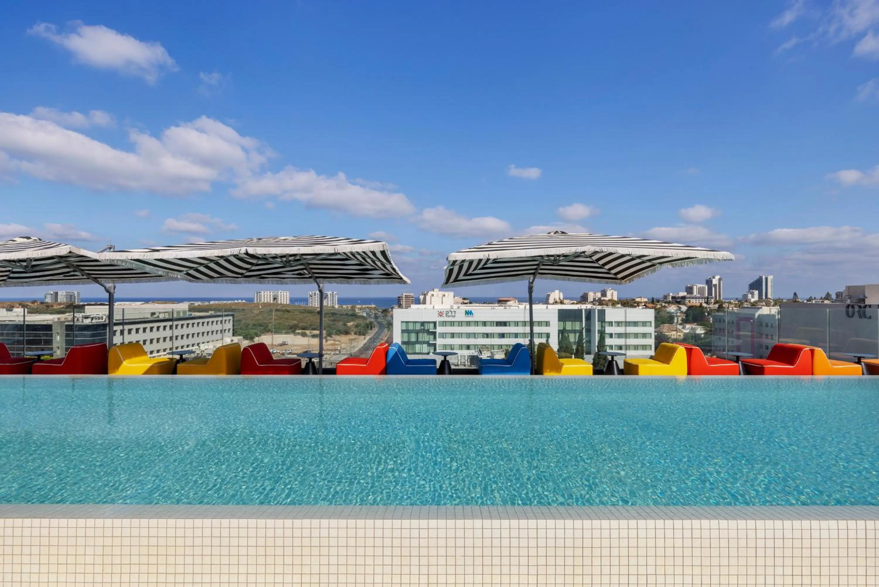 Swimming pool in Publica Isrotel, Autograph Collection