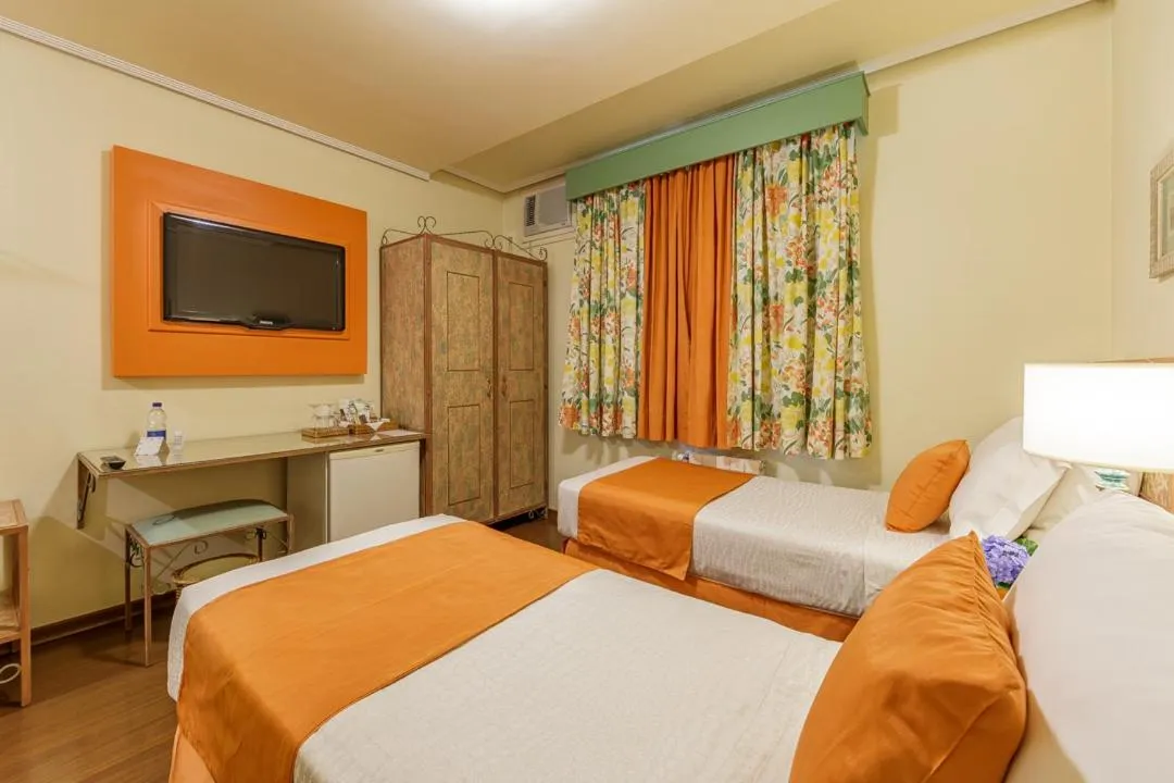 Bed in Hotel Pousada Le Chateau