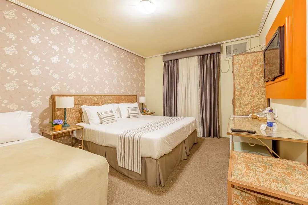 Bed in Hotel Pousada Le Chateau