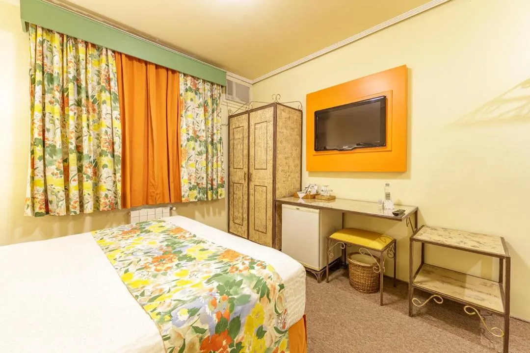 Bed in Hotel Pousada Le Chateau