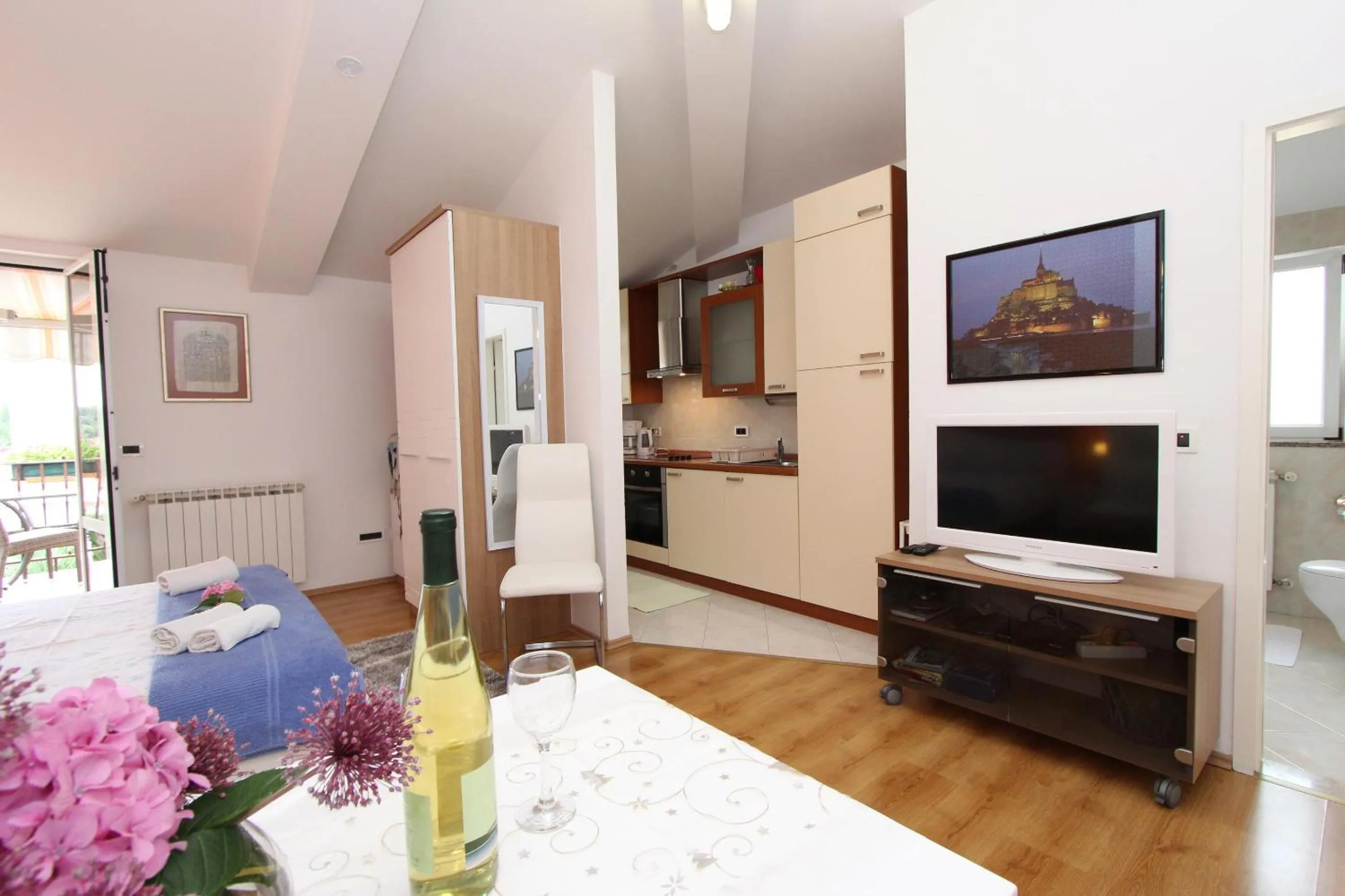 Kitchen or kitchenette, Bed in Apartments Tanja