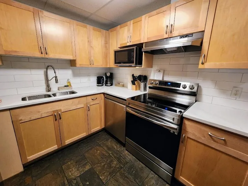 kitchen in Sunset Resorts Canmore and Spa