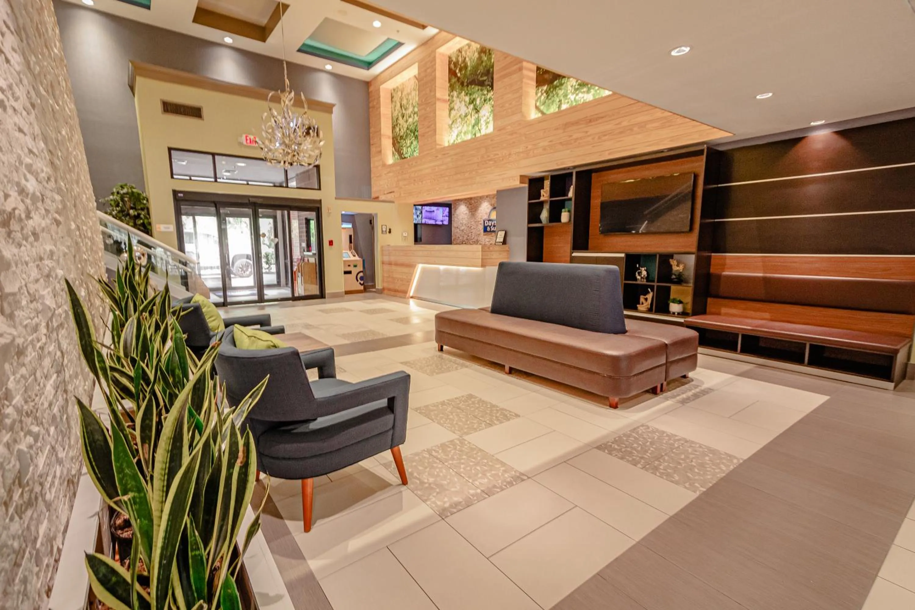 Lobby or reception in Days Inn & Suites by Wyndham Fort Myers Near JetBlue Park