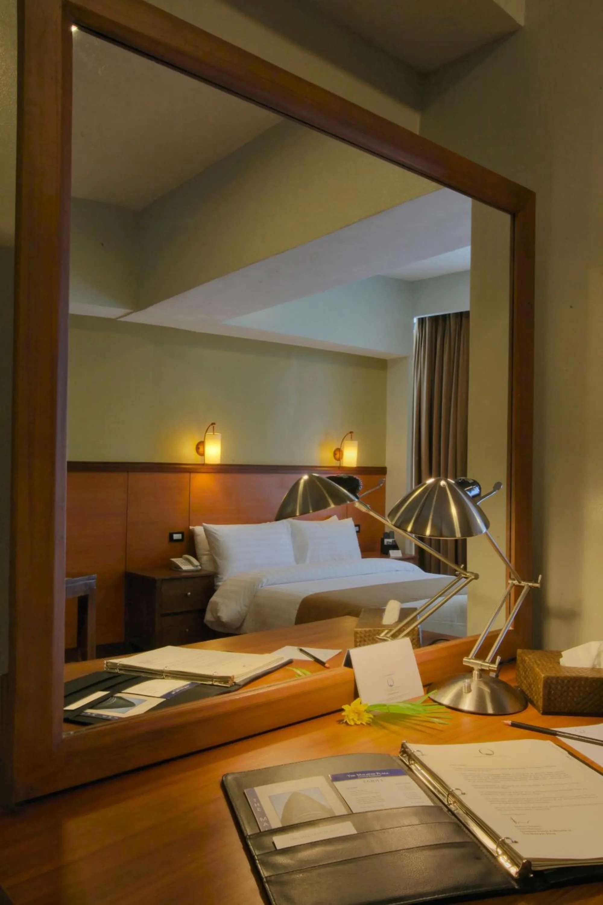 Photo of the whole room, Bed in The Malayan Plaza Hotel