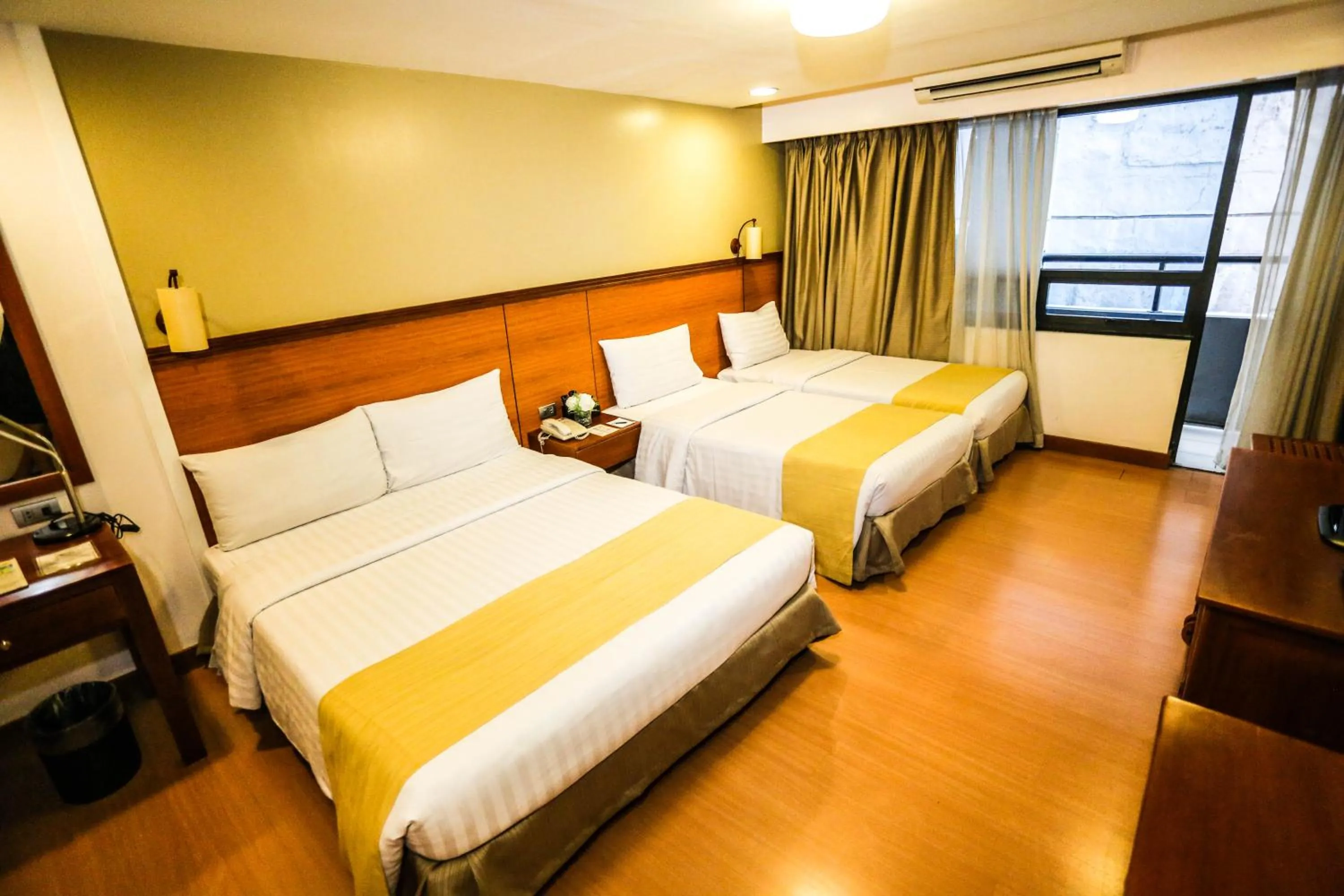 Bedroom, Bed in The Malayan Plaza Hotel