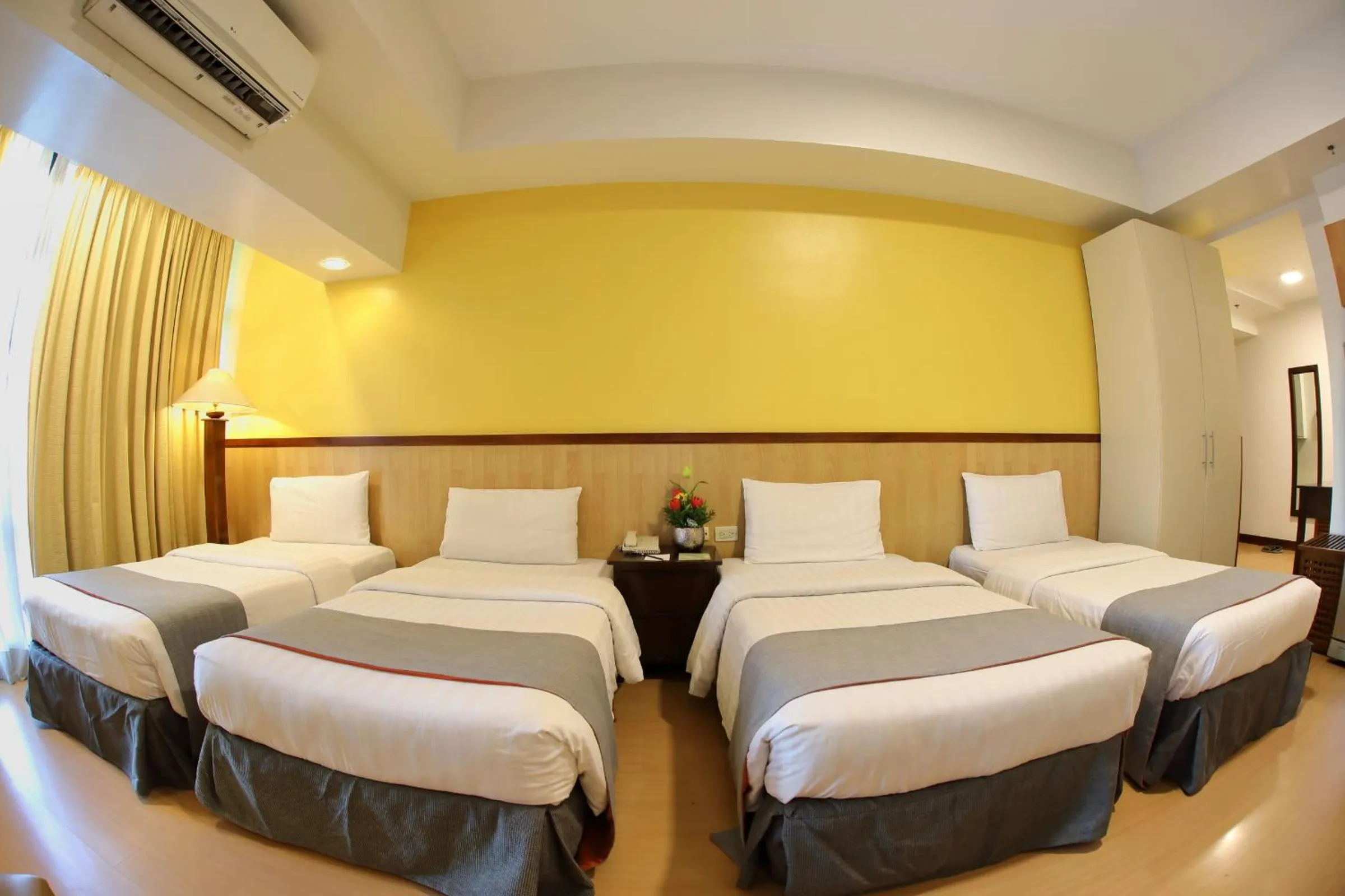 Photo of the whole room, Bed in The Malayan Plaza Hotel